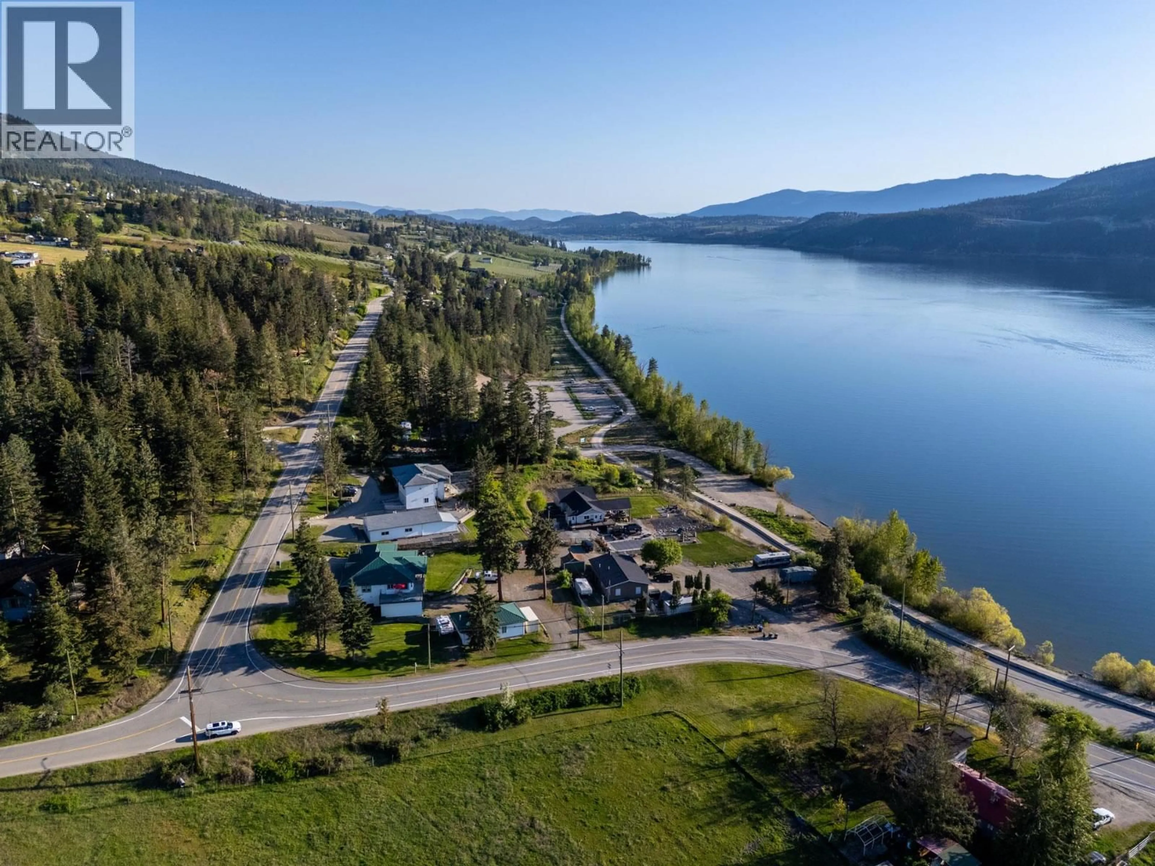 A pic from outside/outdoor area/front of a property/back of a property/a pic from drone, water/lake/river/ocean view for 15326 OYAMA ROAD, Lake Country British Columbia V4V2C5
