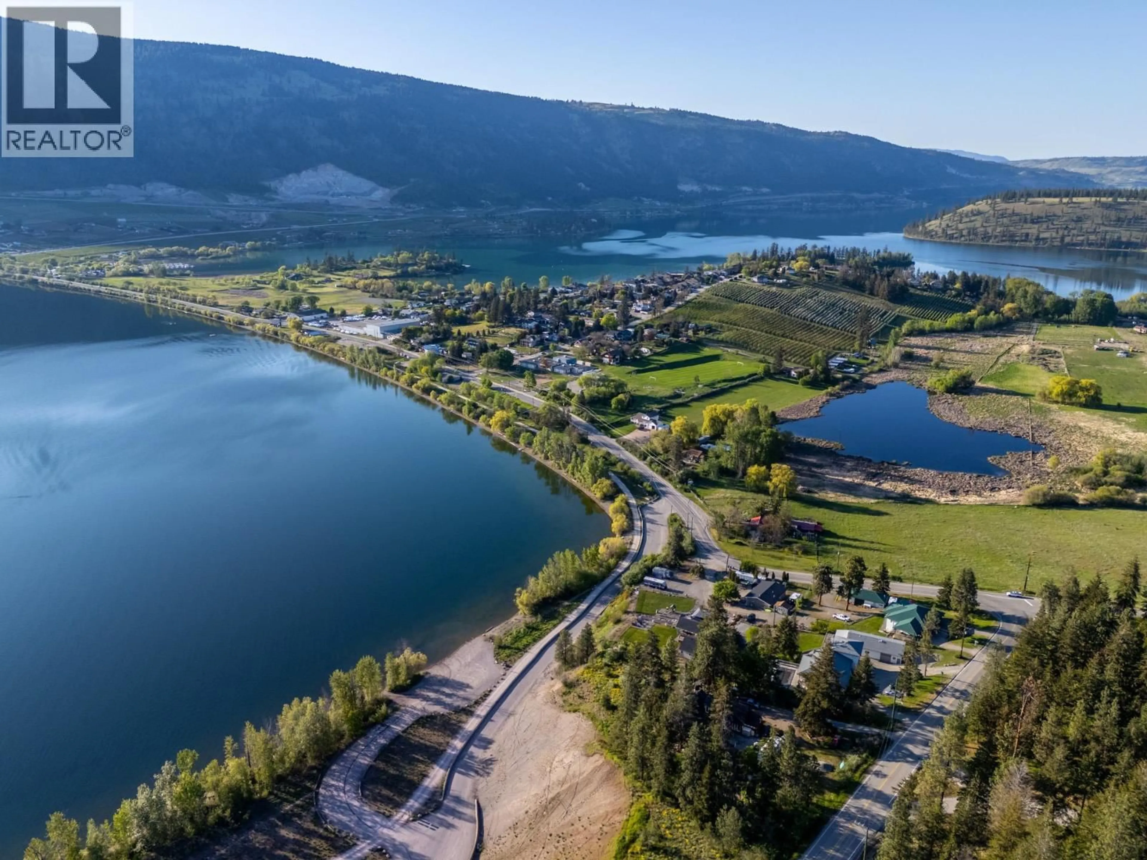 A pic from outside/outdoor area/front of a property/back of a property/a pic from drone, water/lake/river/ocean view for 15326 OYAMA ROAD, Lake Country British Columbia V4V2C5