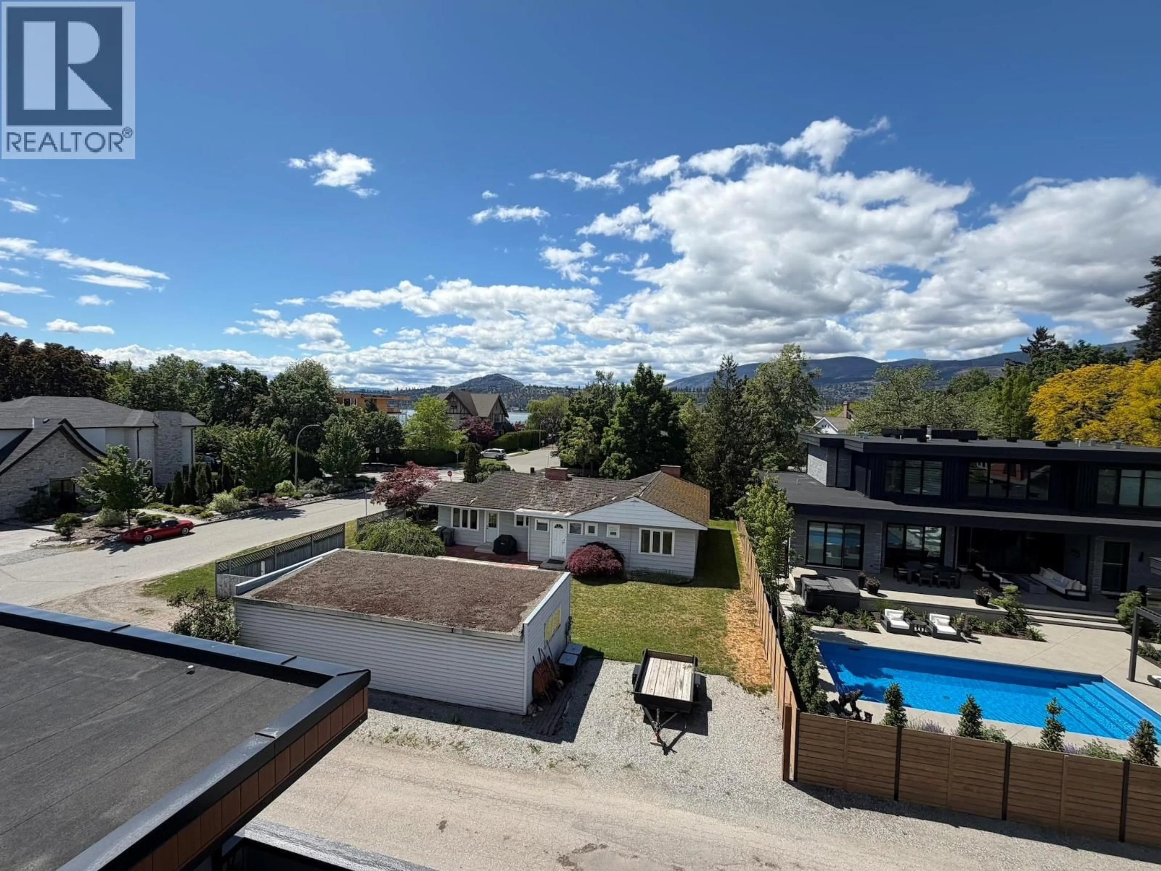 A pic from outside/outdoor area/front of a property/back of a property/a pic from drone, city buildings view from balcony for 2041 ABBOTT STREET, Kelowna British Columbia V1Y1C4