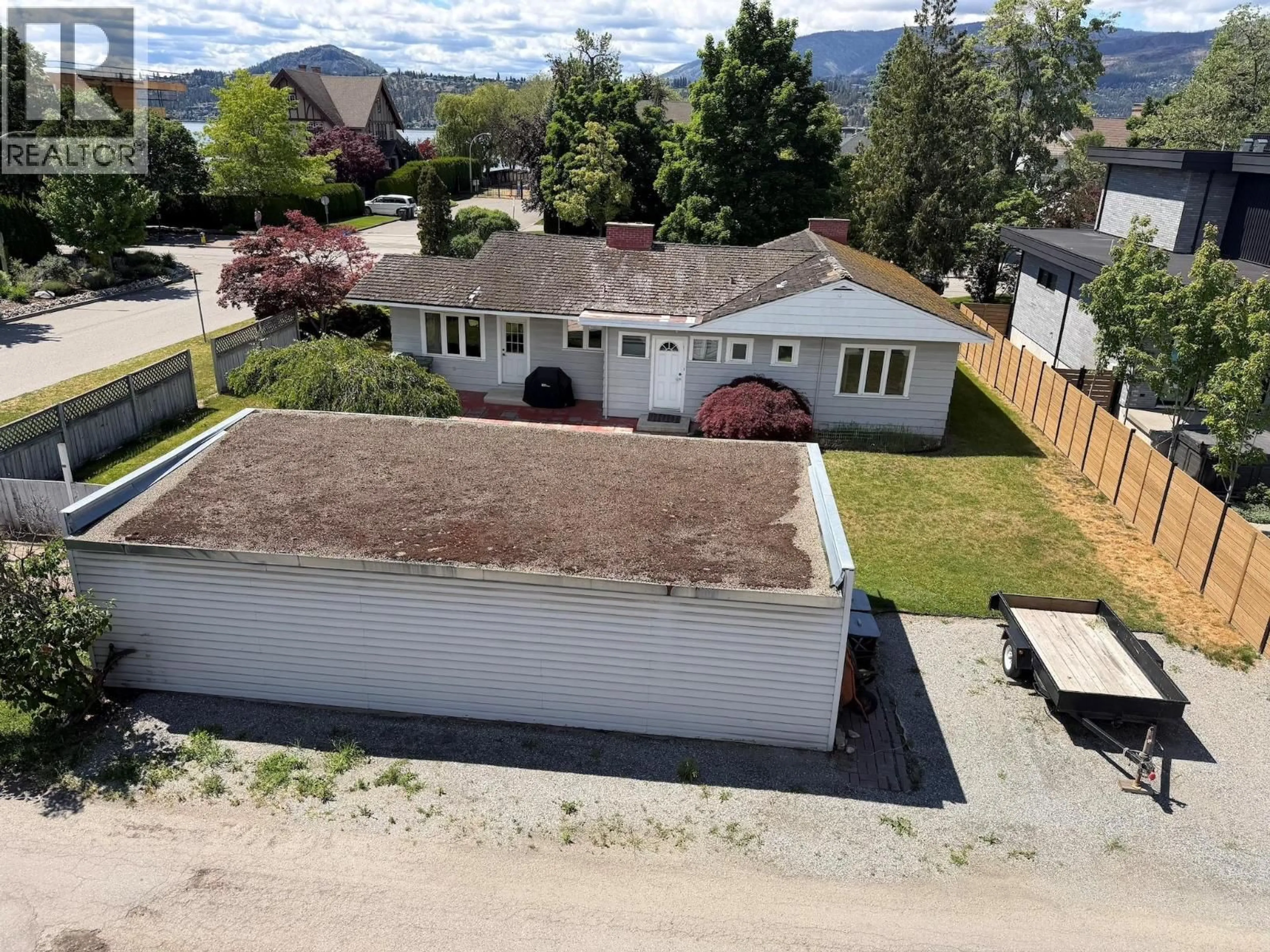 A pic from outside/outdoor area/front of a property/back of a property/a pic from drone, unknown for 2041 ABBOTT STREET, Kelowna British Columbia V1Y1C4