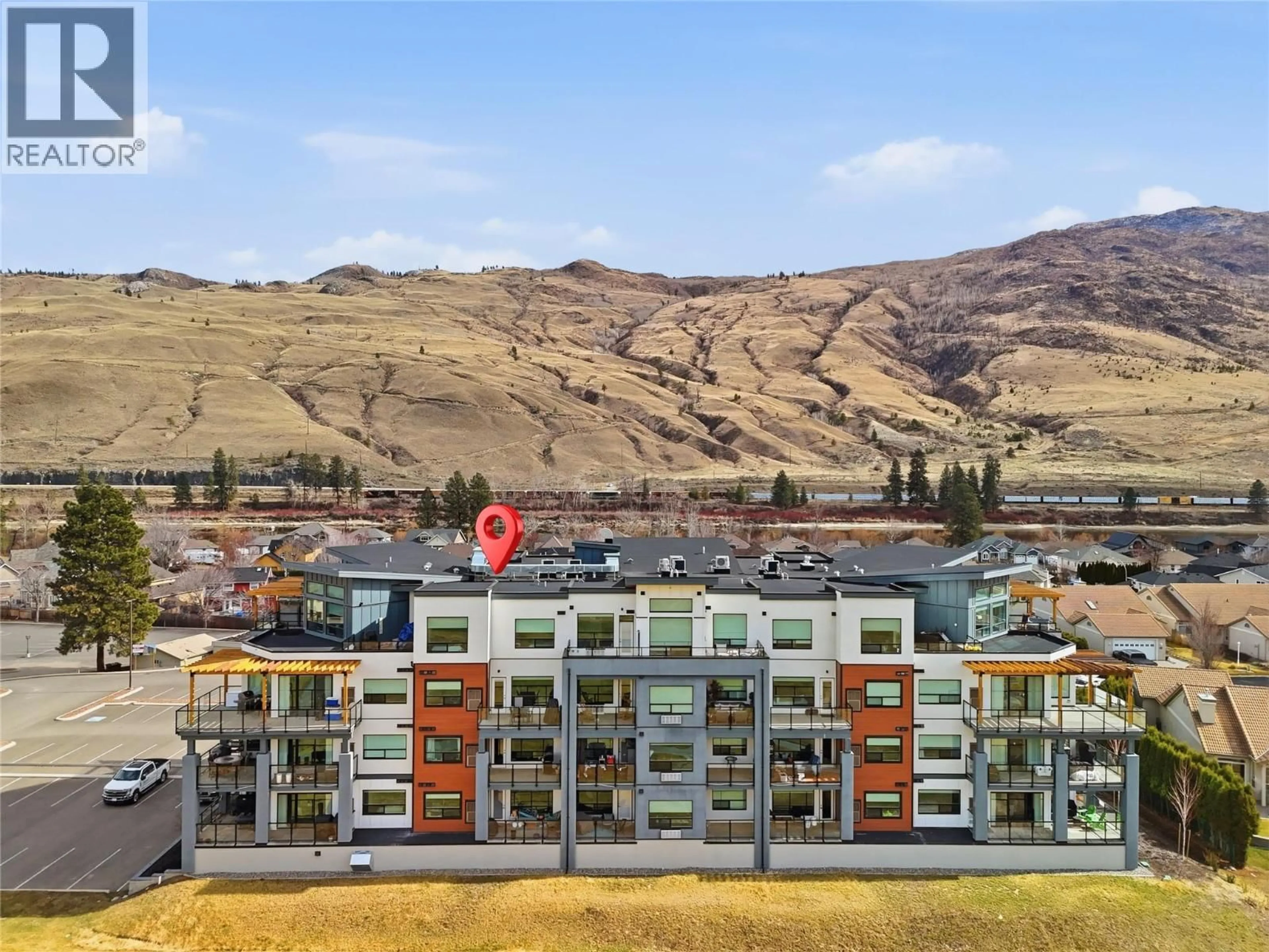 A pic from outside/outdoor area/front of a property/back of a property/a pic from drone, mountain view for 209 - 651 DUNES DRIVE, Kamloops British Columbia V2B8M8