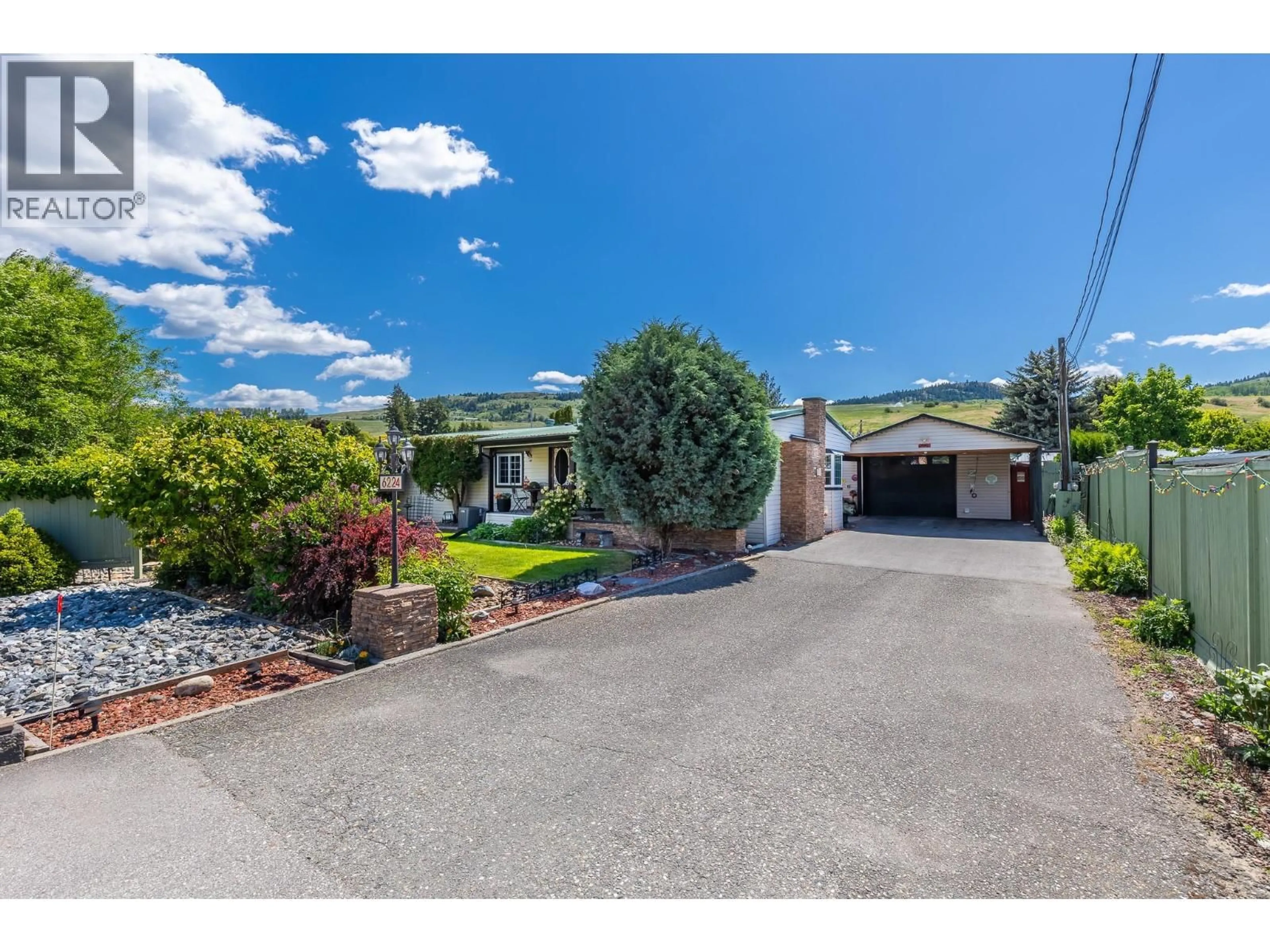 A pic from outside/outdoor area/front of a property/back of a property/a pic from drone, street for 6224 OSPREY ROAD, Vernon British Columbia V1H1M7
