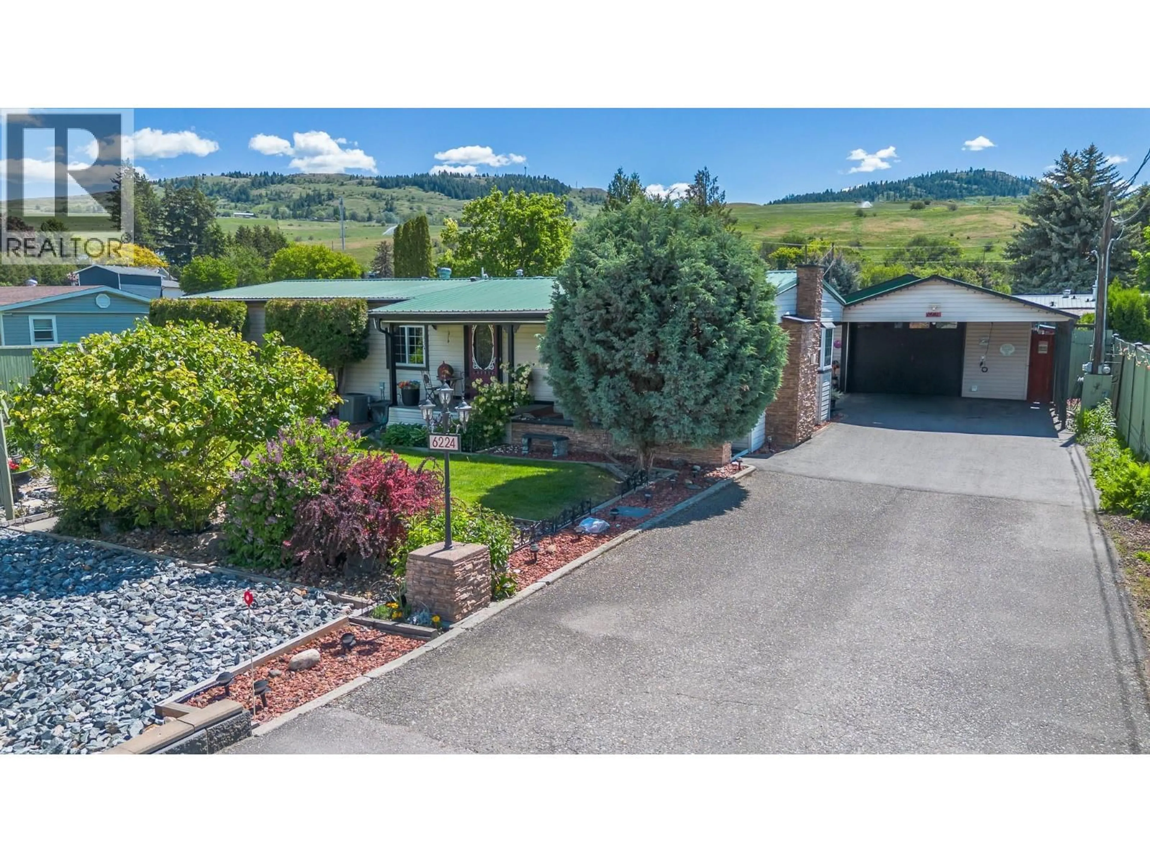 A pic from outside/outdoor area/front of a property/back of a property/a pic from drone, mountain view for 6224 OSPREY ROAD, Vernon British Columbia V1H1M7