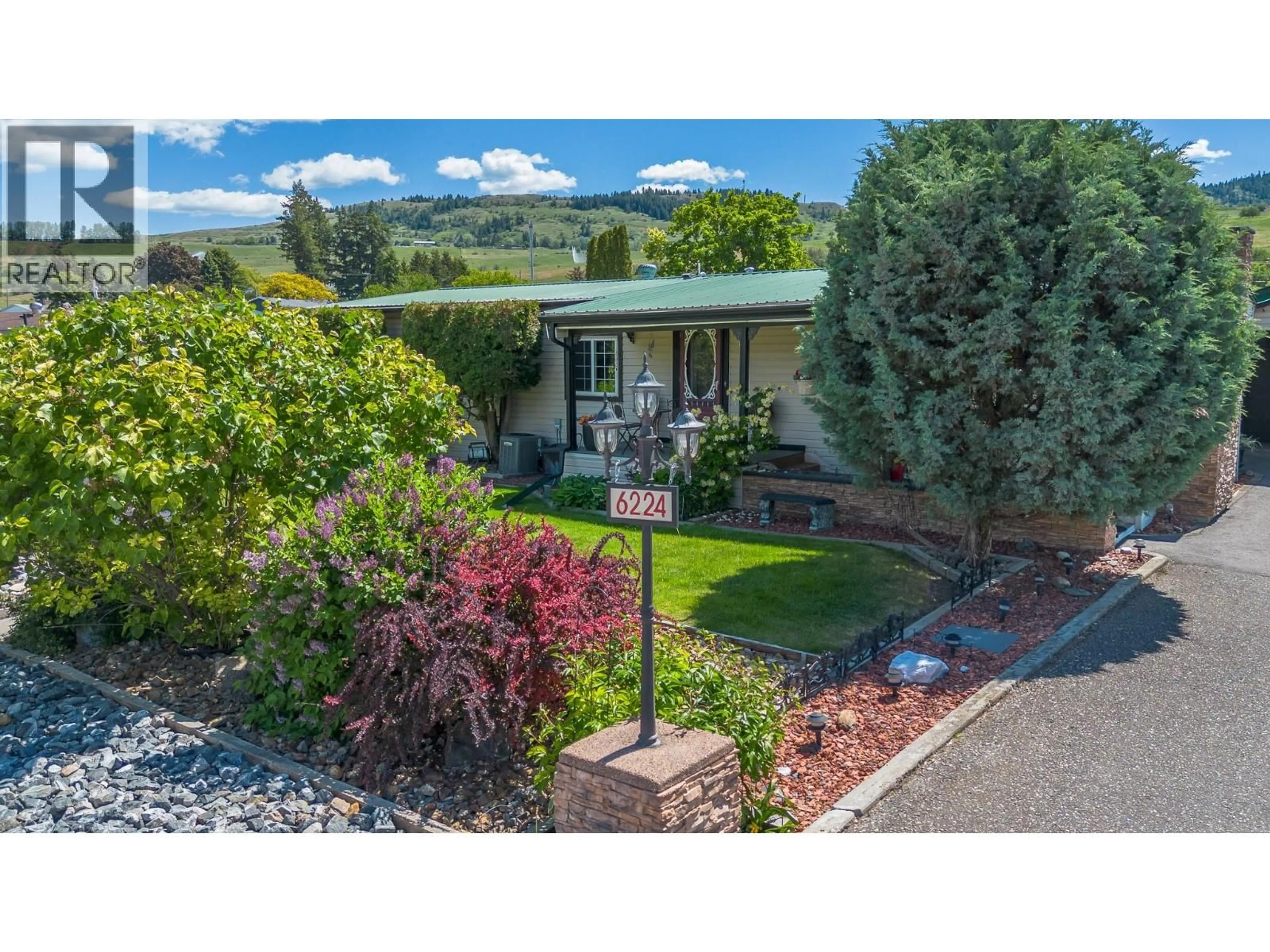 A pic from outside/outdoor area/front of a property/back of a property/a pic from drone, mountain view for 6224 OSPREY ROAD, Vernon British Columbia V1H1M7