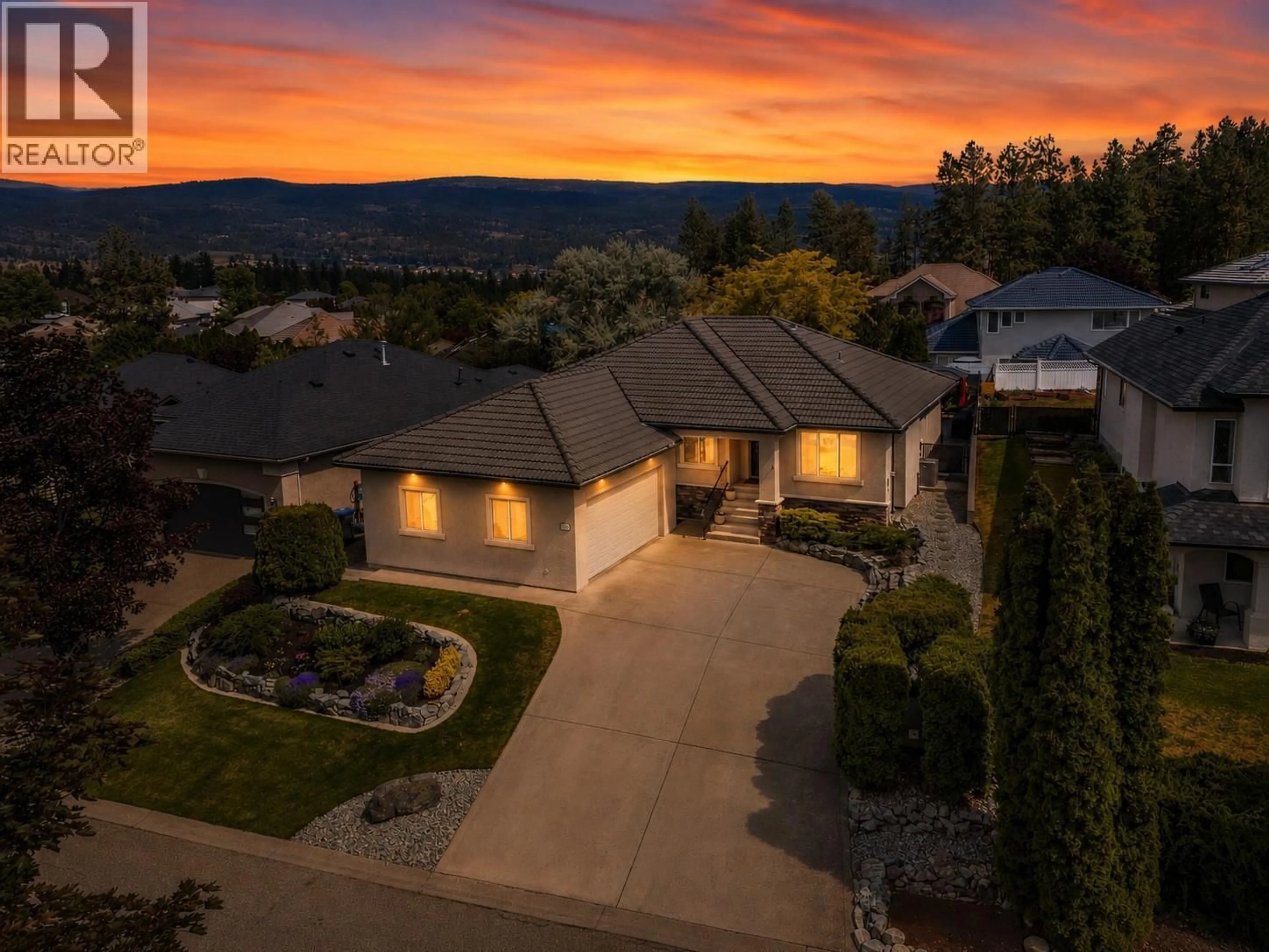 A pic from outside/outdoor area/front of a property/back of a property/a pic from drone, mountain view for 2473 QUAIL PLACE, Kelowna British Columbia V1V1Z7