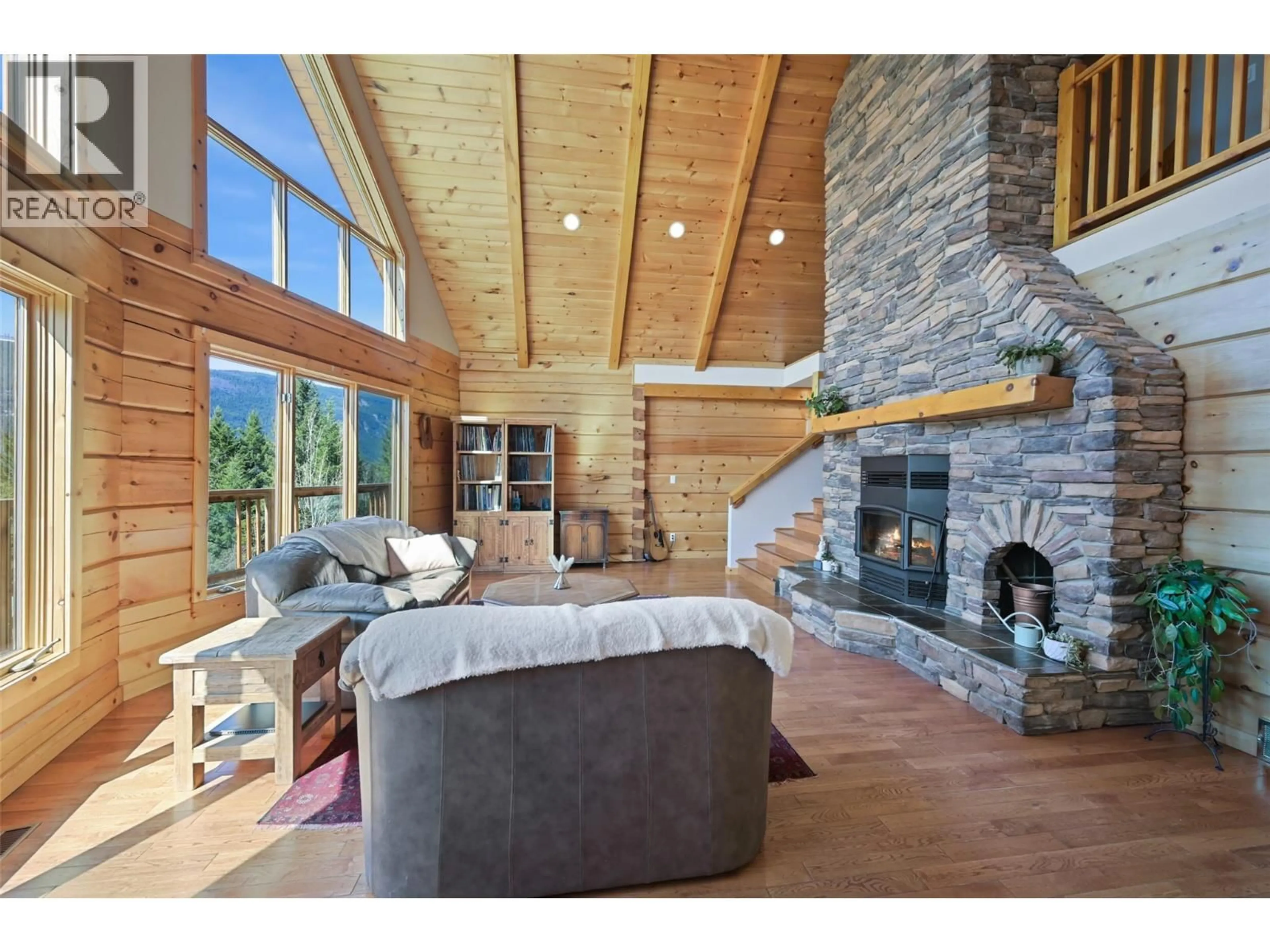 Living room with furniture, wood/laminate floor for 110 HIGHWAY 95 OTHER, Spillimacheen British Columbia V0A1P0