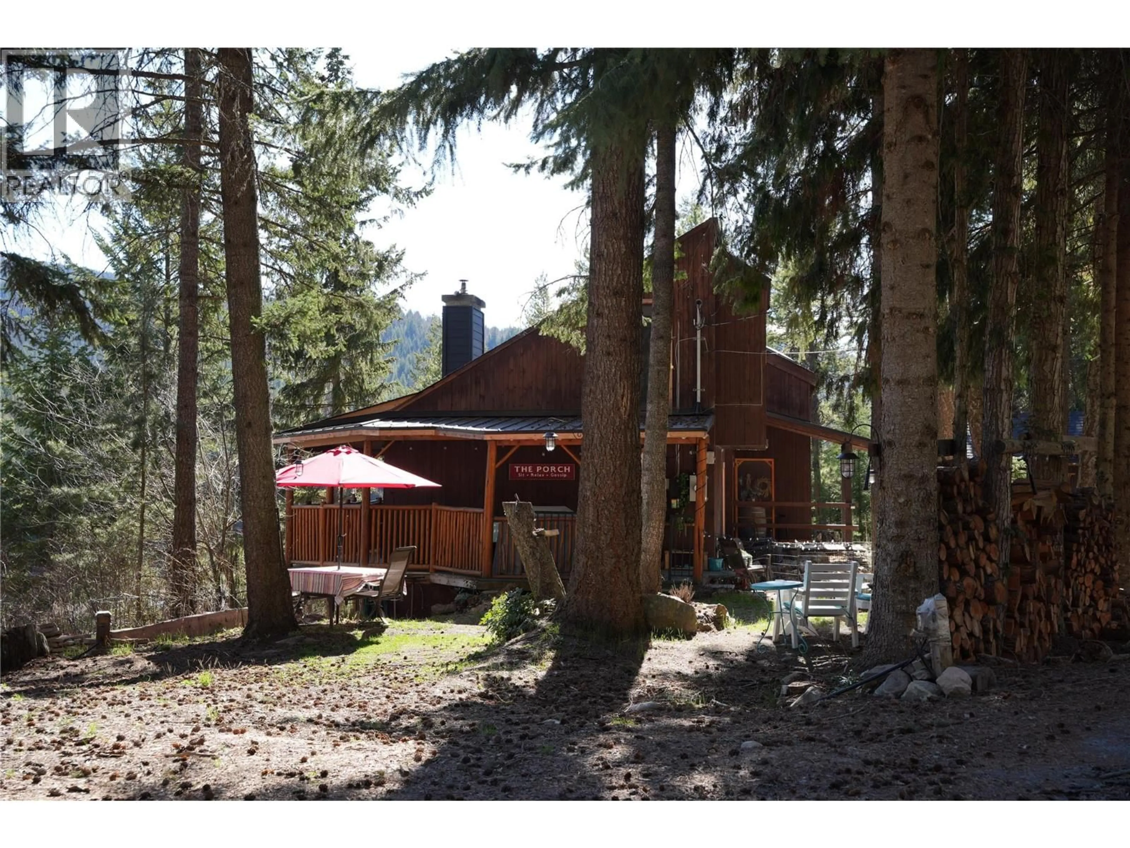 A pic from outside/outdoor area/front of a property/back of a property/a pic from drone, forest/trees view for 11251 THREE FORKS ROAD, Kelowna British Columbia V1P1J8