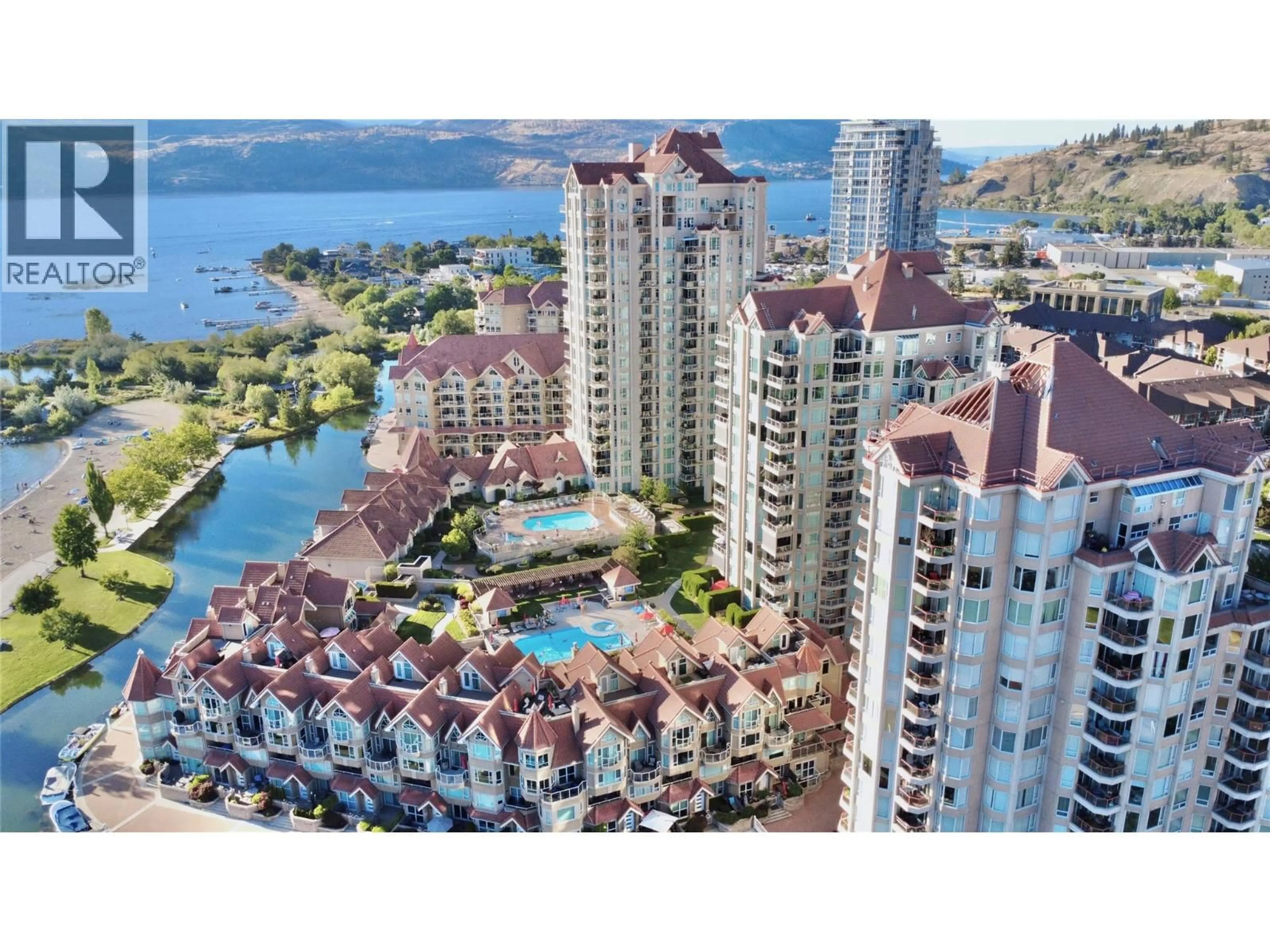 A pic from outside/outdoor area/front of a property/back of a property/a pic from drone, water/lake/river/ocean view for 1702 - 1152 SUNSET DRIVE, Kelowna British Columbia V1Y9R7