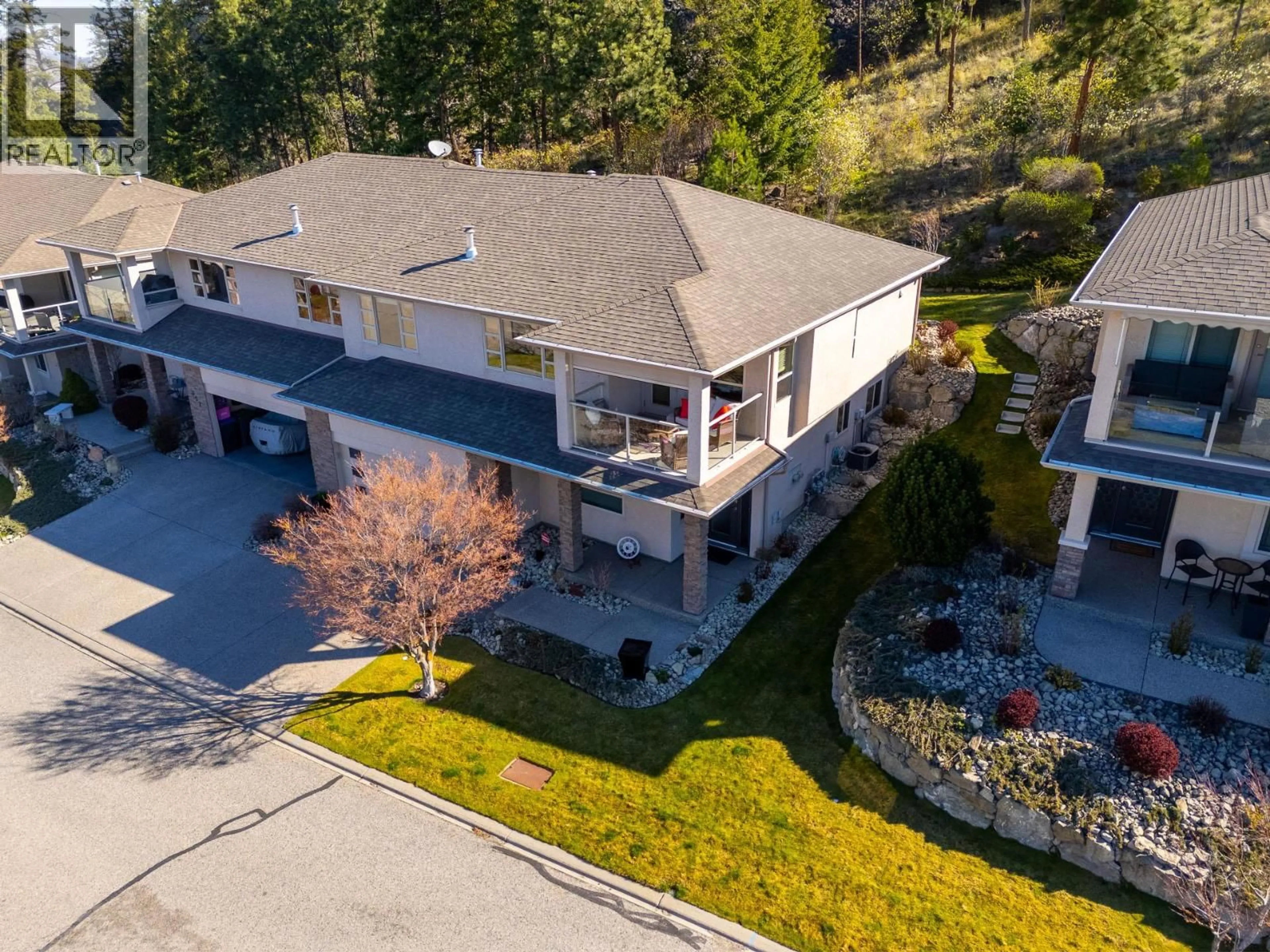 A pic from outside/outdoor area/front of a property/back of a property/a pic from drone, mountain view for 358 - 663 DENALI COURT, Kelowna British Columbia V1V2R4