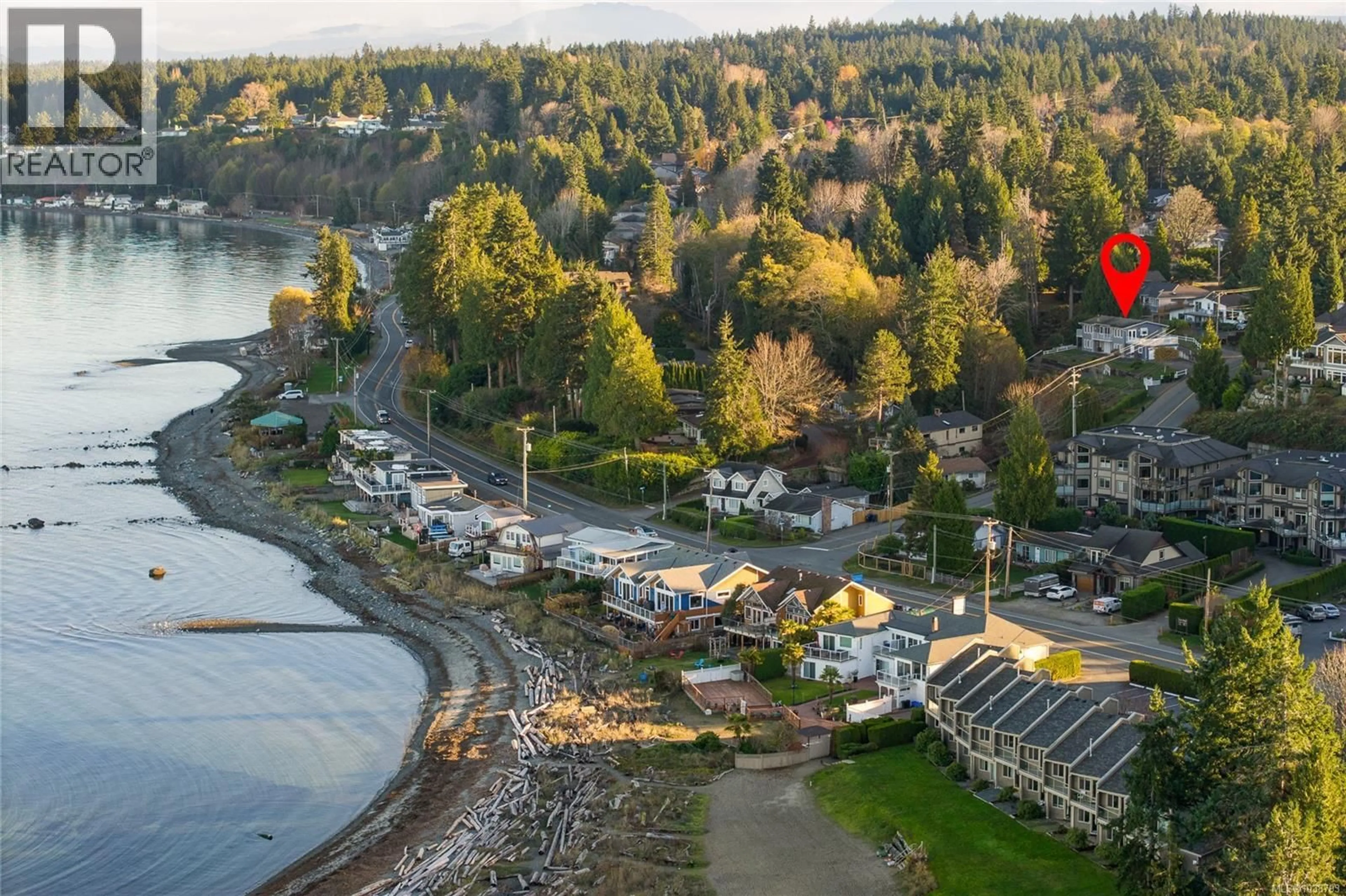 A pic from outside/outdoor area/front of a property/back of a property/a pic from drone, water/lake/river/ocean view for 350 GARRETT ROAD, Qualicum Beach British Columbia V9K1H4