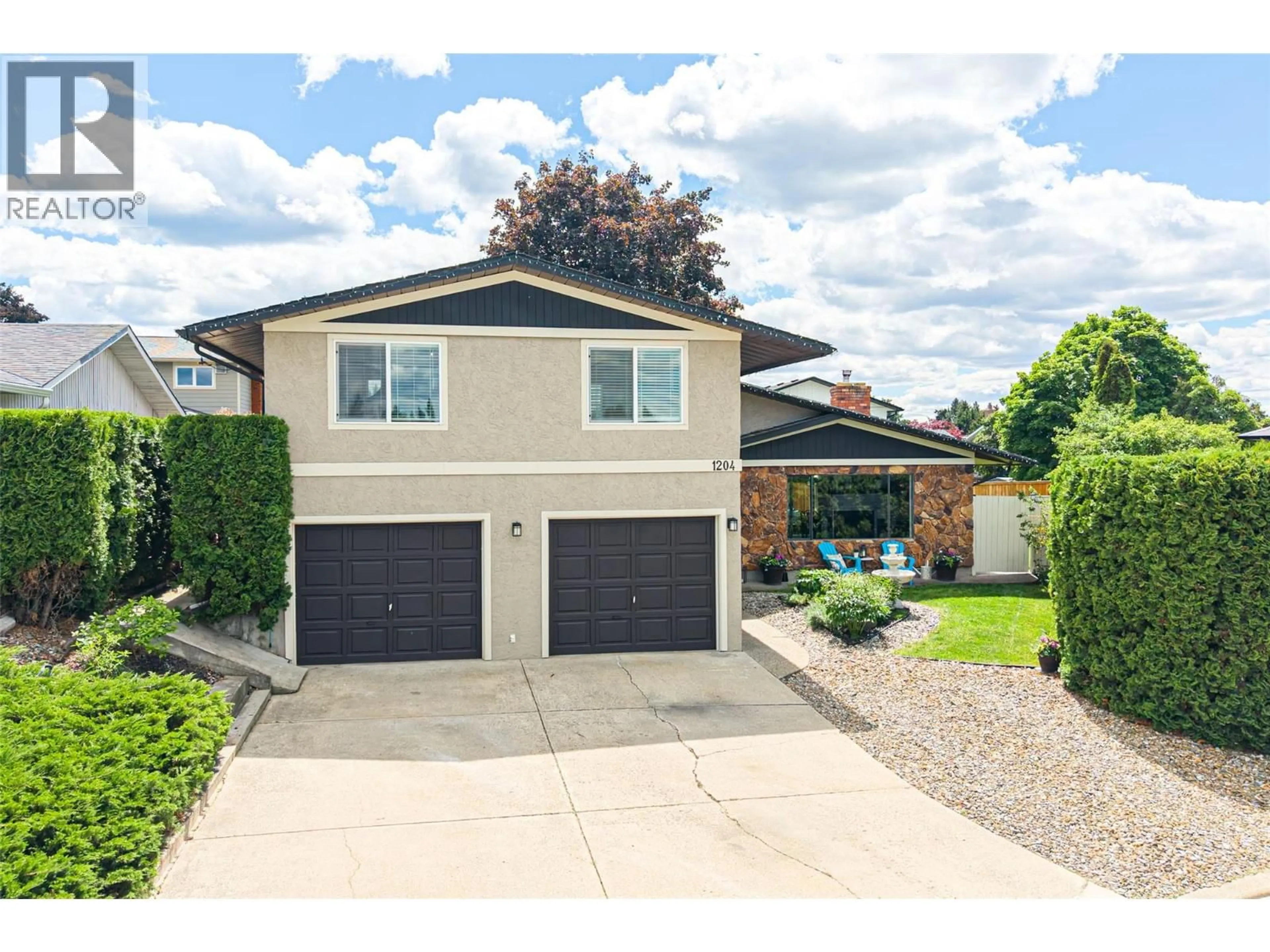 Home with vinyl exterior material, street for 1204 42 AVENUE, Vernon British Columbia V1B4A2