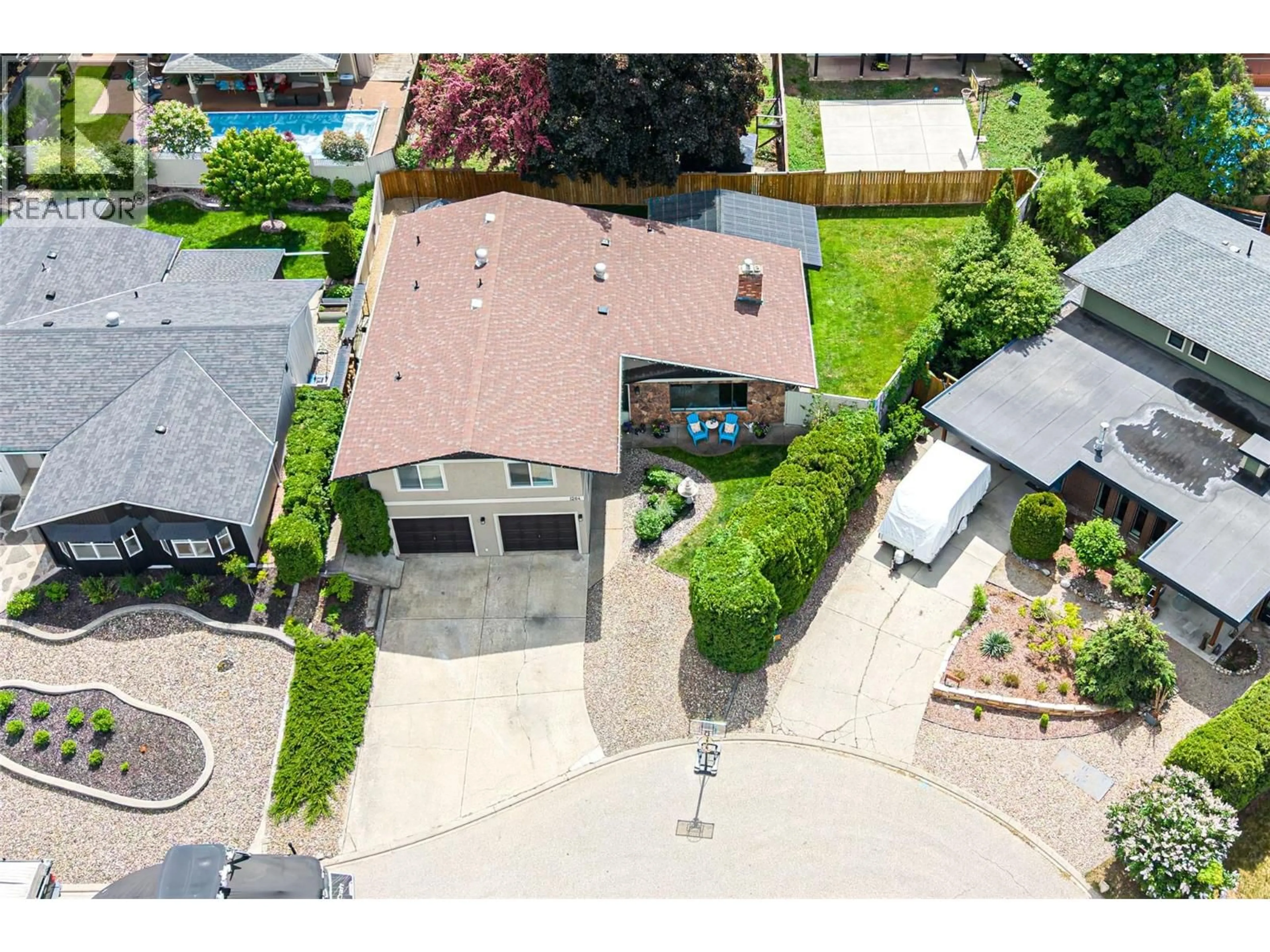 A pic from outside/outdoor area/front of a property/back of a property/a pic from drone, street for 1204 42 AVENUE, Vernon British Columbia V1B4A2