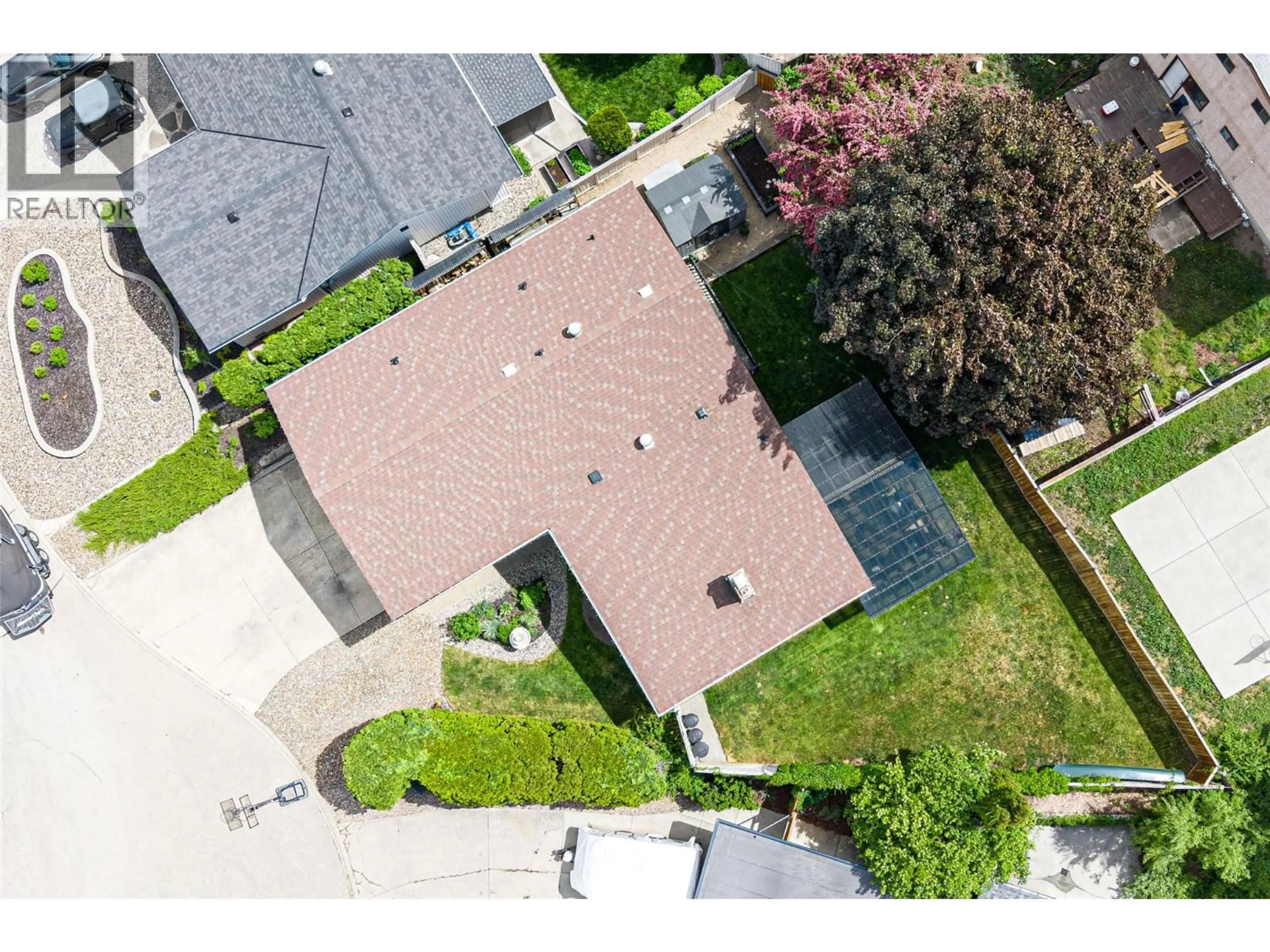 A pic from outside/outdoor area/front of a property/back of a property/a pic from drone, street for 1204 42 AVENUE, Vernon British Columbia V1B4A2