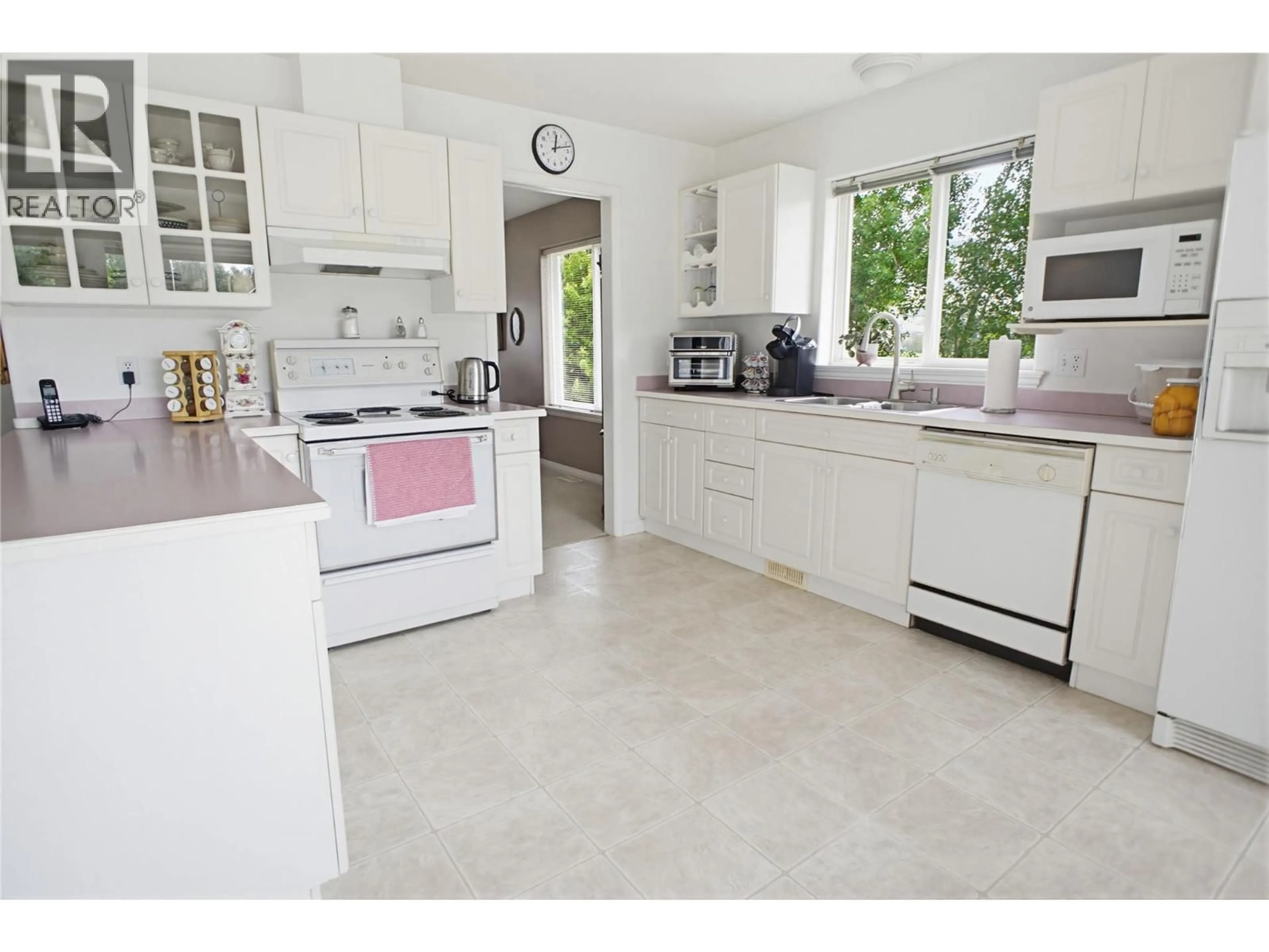 Open concept kitchen, ceramic/tile floor for 161 HASLETT ROAD, Kamloops British Columbia V2H1T8
