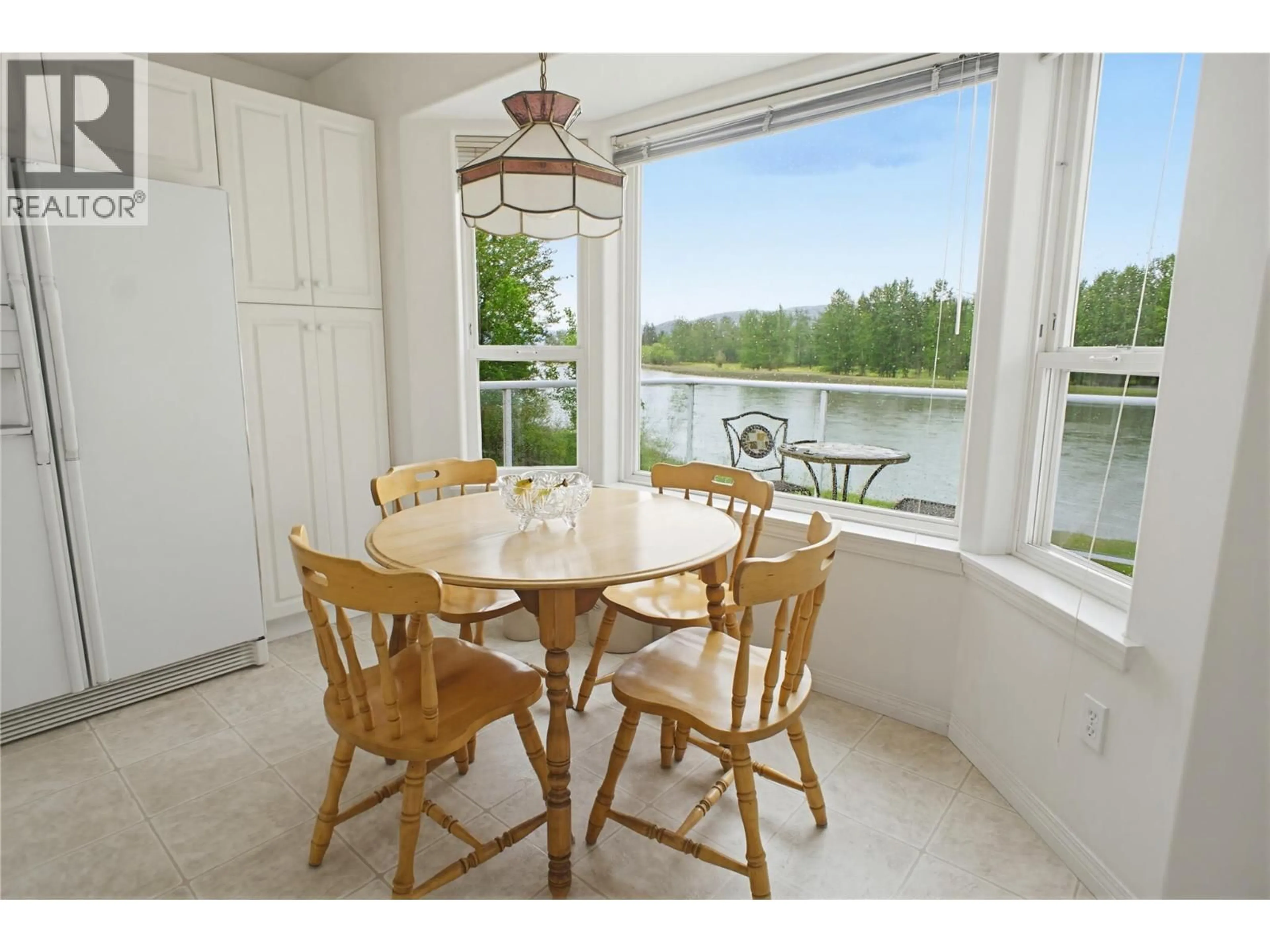 Dining room, wood/laminate floor for 161 HASLETT ROAD, Kamloops British Columbia V2H1T8