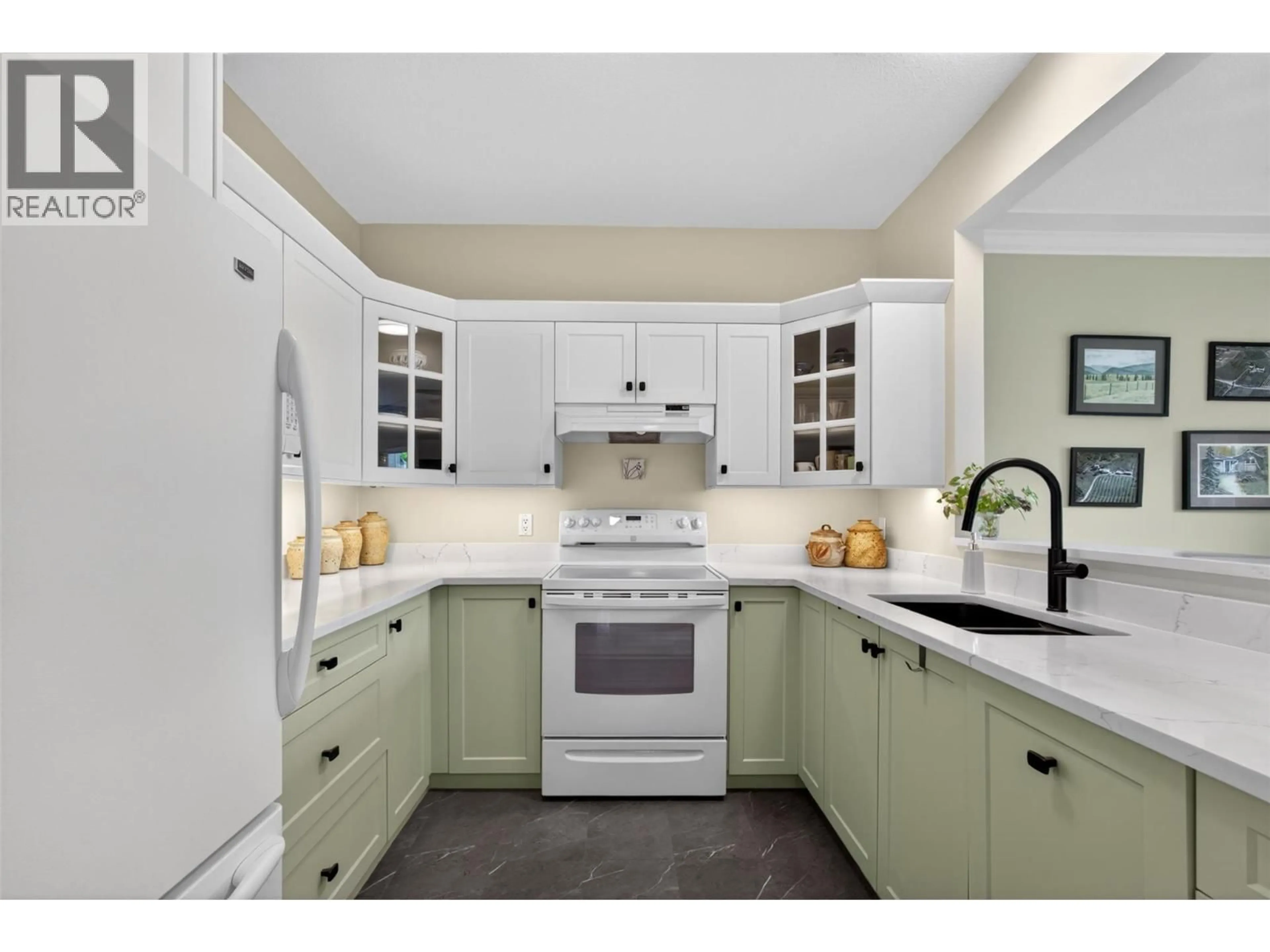 Open concept kitchen, ceramic/tile floor for 106 - 877 KLO ROAD, Kelowna British Columbia V1Y9R1