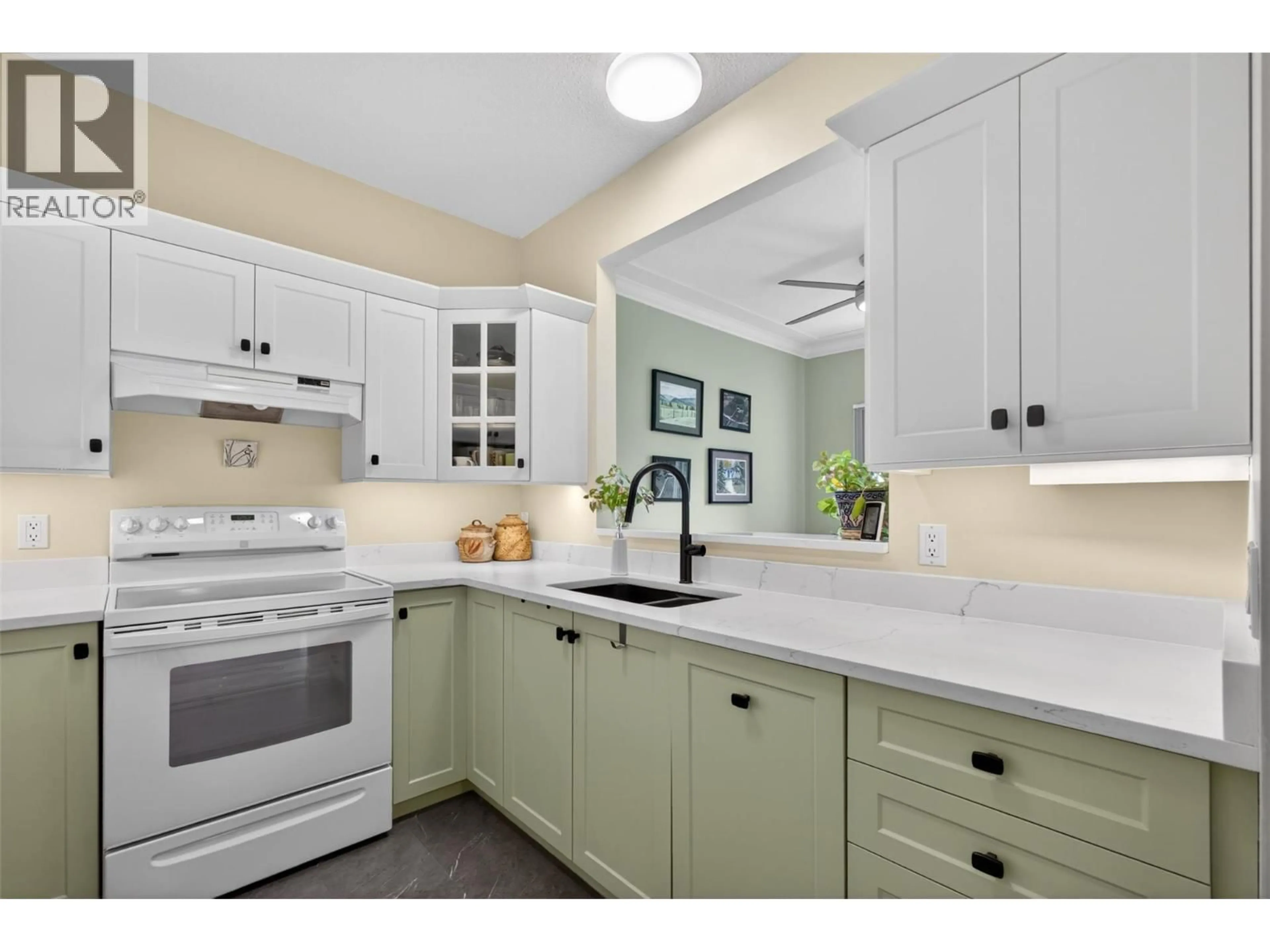 Open concept kitchen, ceramic/tile floor for 106 - 877 KLO ROAD, Kelowna British Columbia V1Y9R1