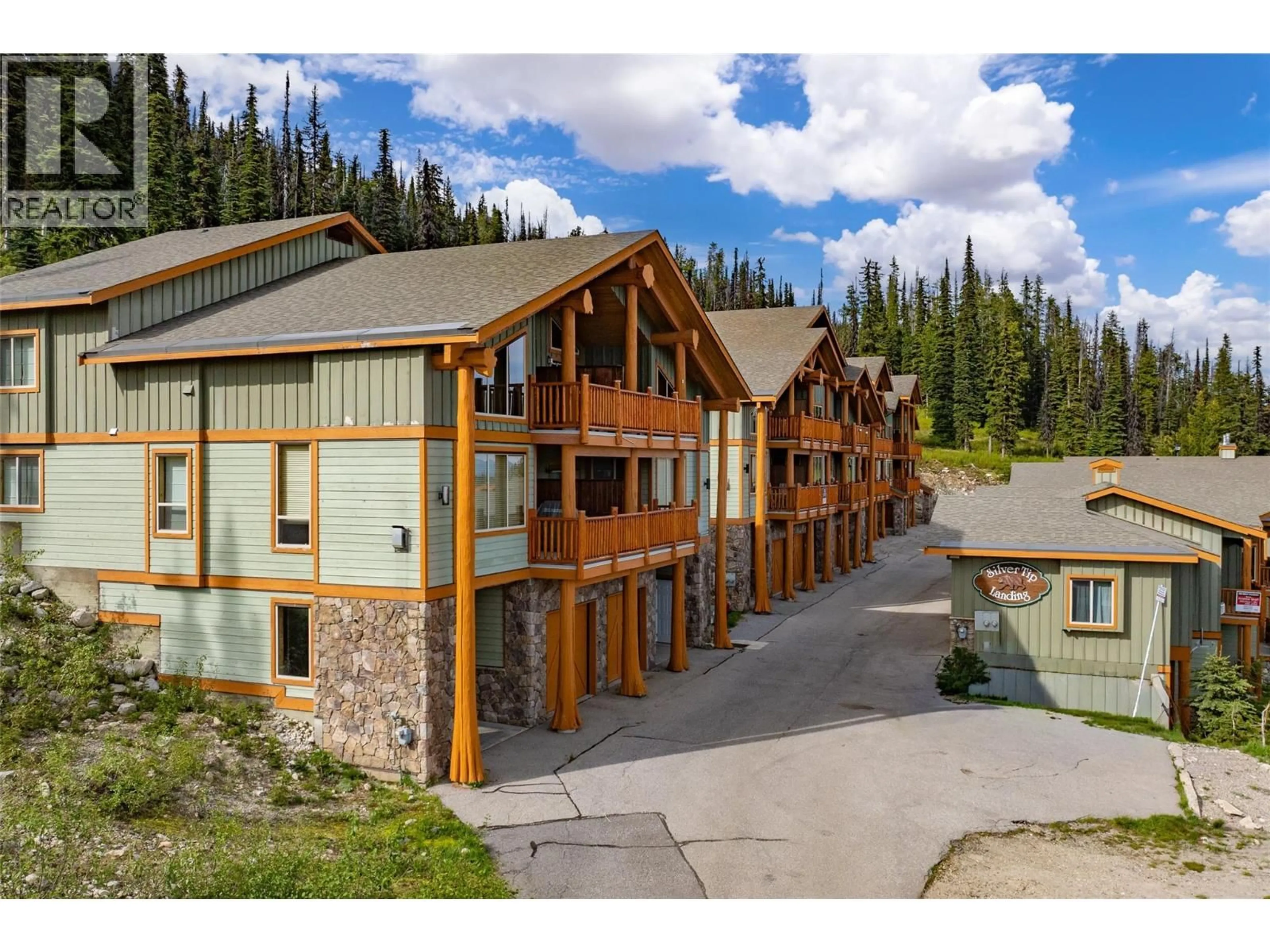 A pic from outside/outdoor area/front of a property/back of a property/a pic from drone, mountain view for 8 - 5940 SNOW PINES WAY, Big White British Columbia V1P1P3