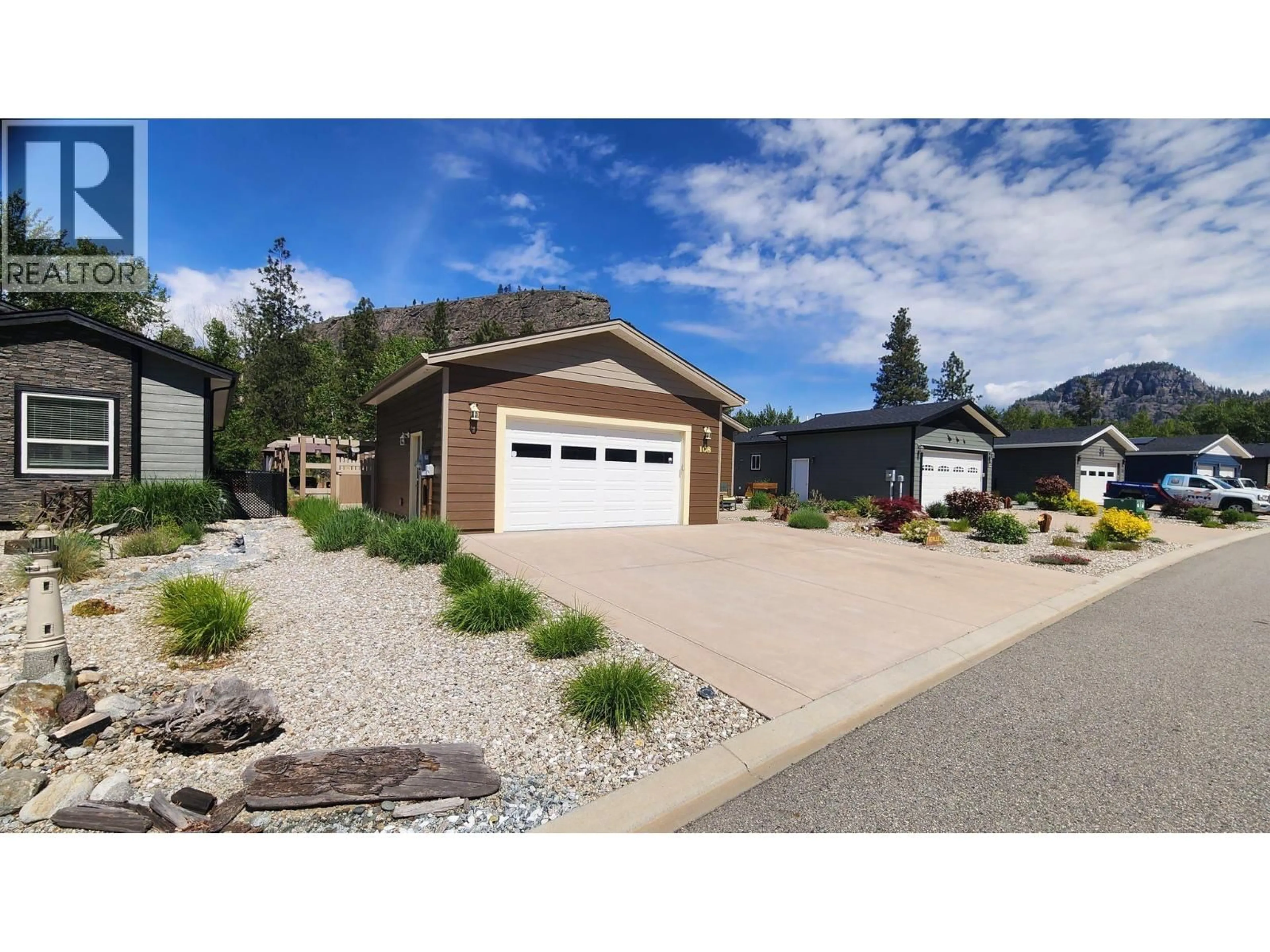 Home with vinyl exterior material, street for 108 - 8300 GALLAGHER LAKE FRONTAGE ROAD, Oliver British Columbia V0H1T2