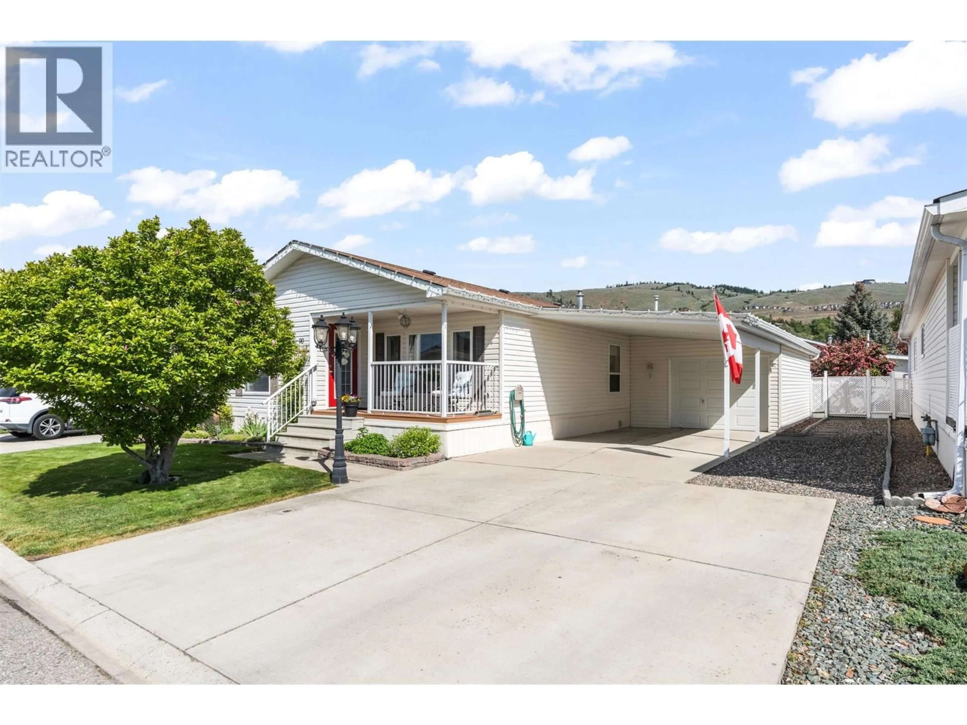 Home with vinyl exterior material, street for 90 - 6688 TRONSON ROAD, Vernon British Columbia V1H1R9
