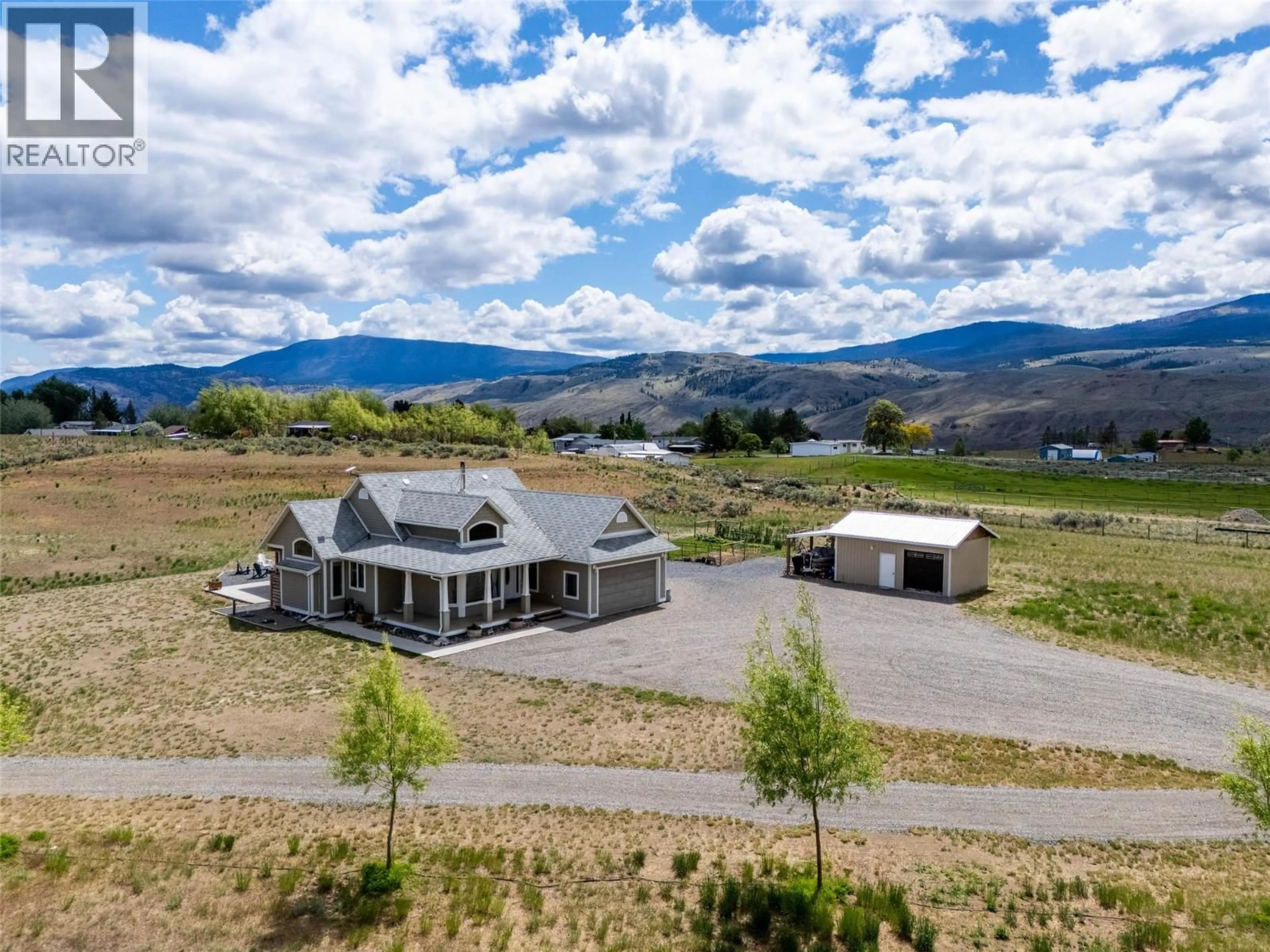 A pic from outside/outdoor area/front of a property/back of a property/a pic from drone, mountain view for 1480 THOMPSON RIVER DRIVE, Kamloops British Columbia V0K2J0