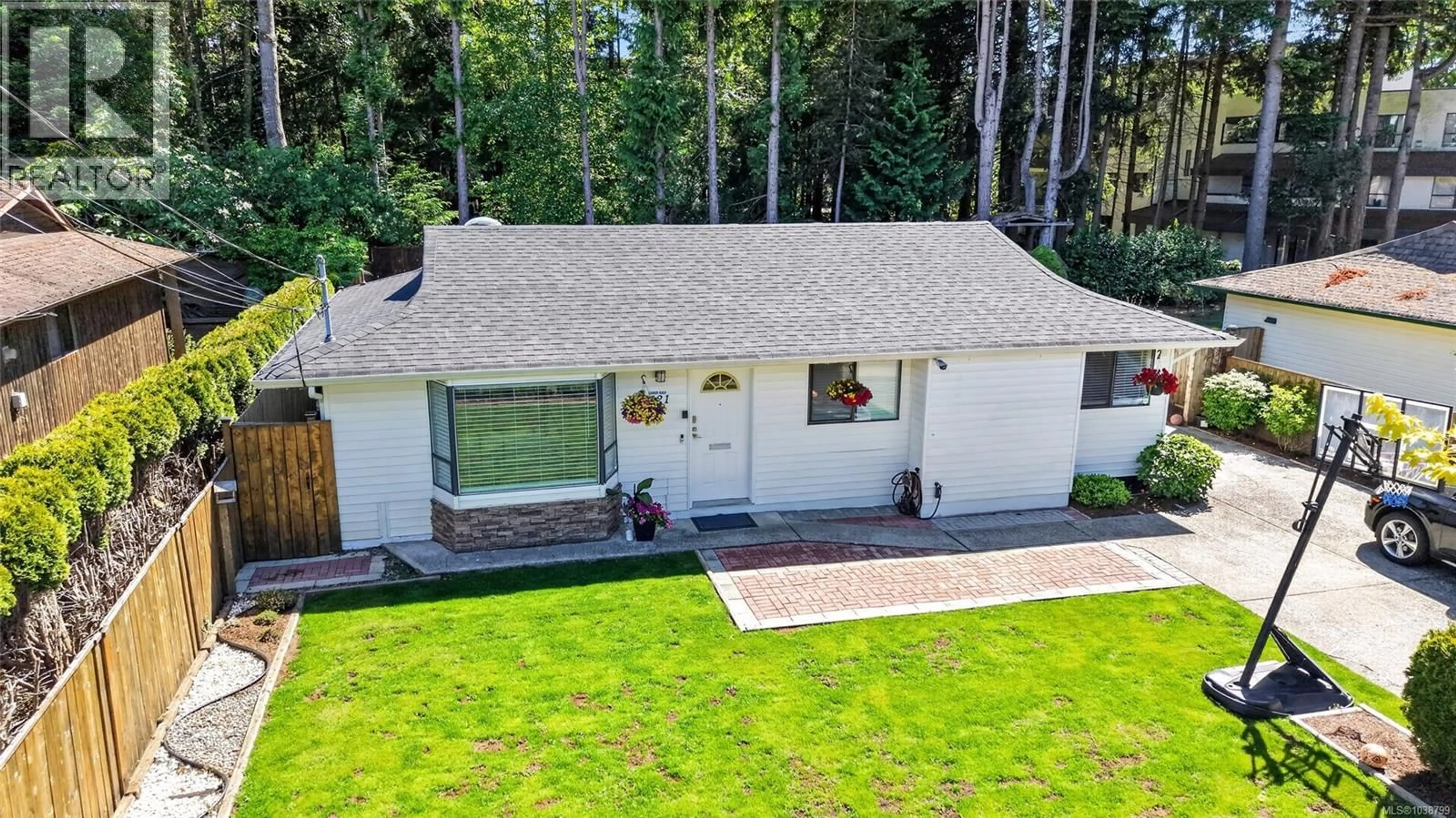 A pic from outside/outdoor area/front of a property/back of a property/a pic from drone, street for 6421 PORTSMOUTH ROAD, Nanaimo British Columbia V9V1A3