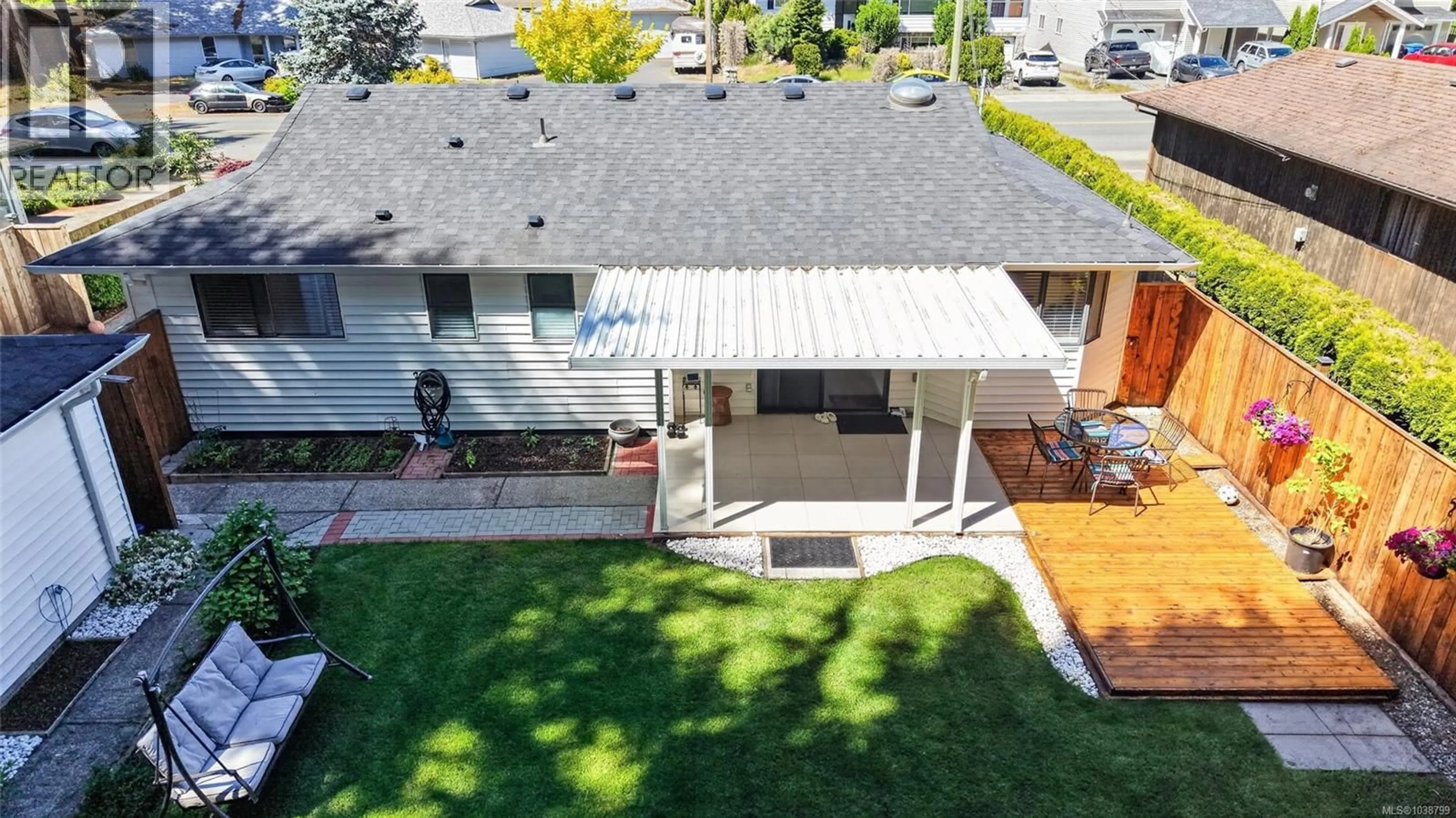 A pic from outside/outdoor area/front of a property/back of a property/a pic from drone, street for 6421 PORTSMOUTH ROAD, Nanaimo British Columbia V9V1A3