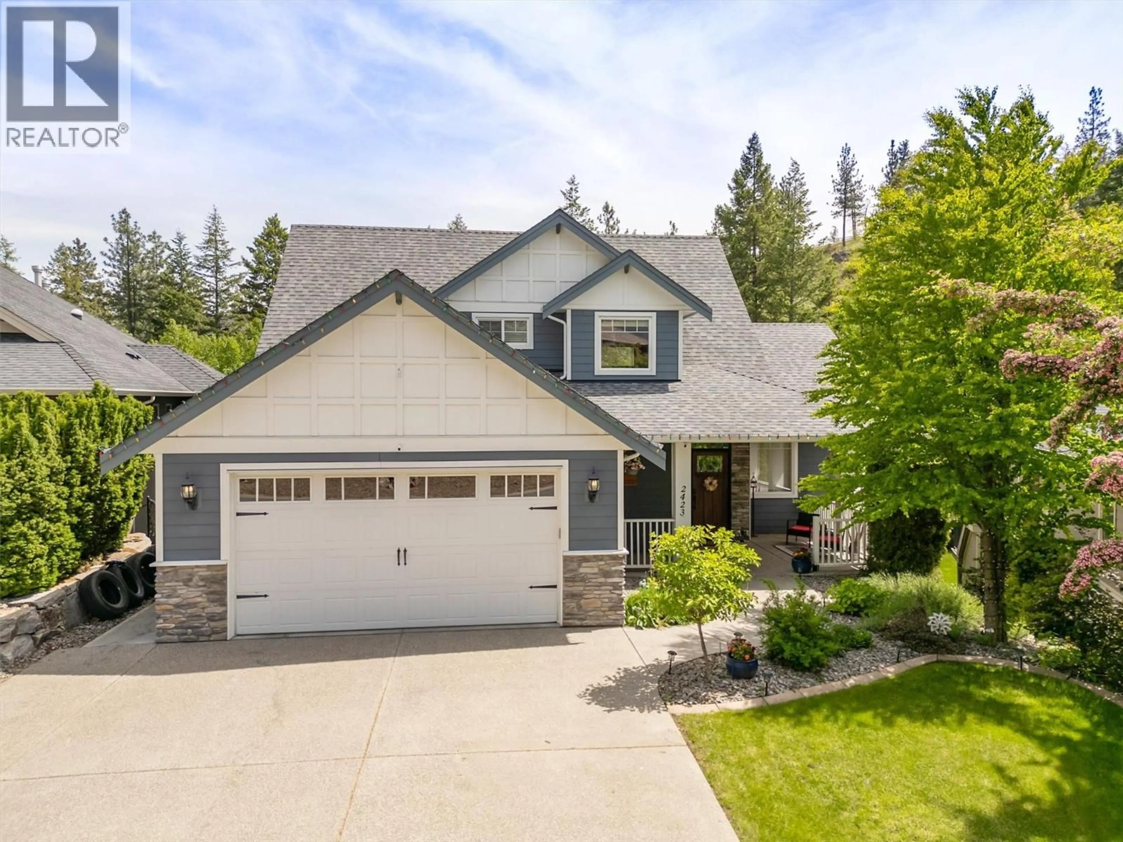 Home with vinyl exterior material, street for 2423 PARAMOUNT DRIVE, West Kelowna British Columbia V4T3K4