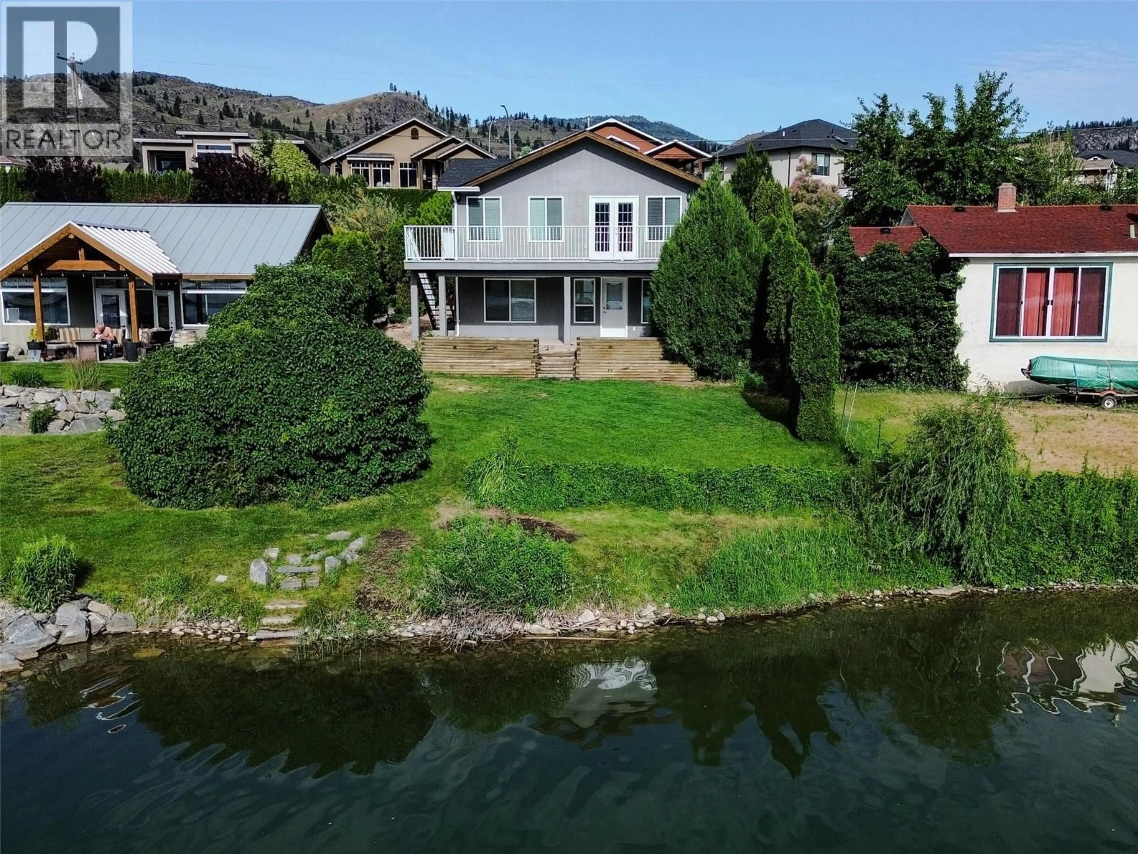 A pic from outside/outdoor area/front of a property/back of a property/a pic from drone, water/lake/river/ocean view for 6905 LAKSEIDE DRIVE, Oliver British Columbia V0H1T4