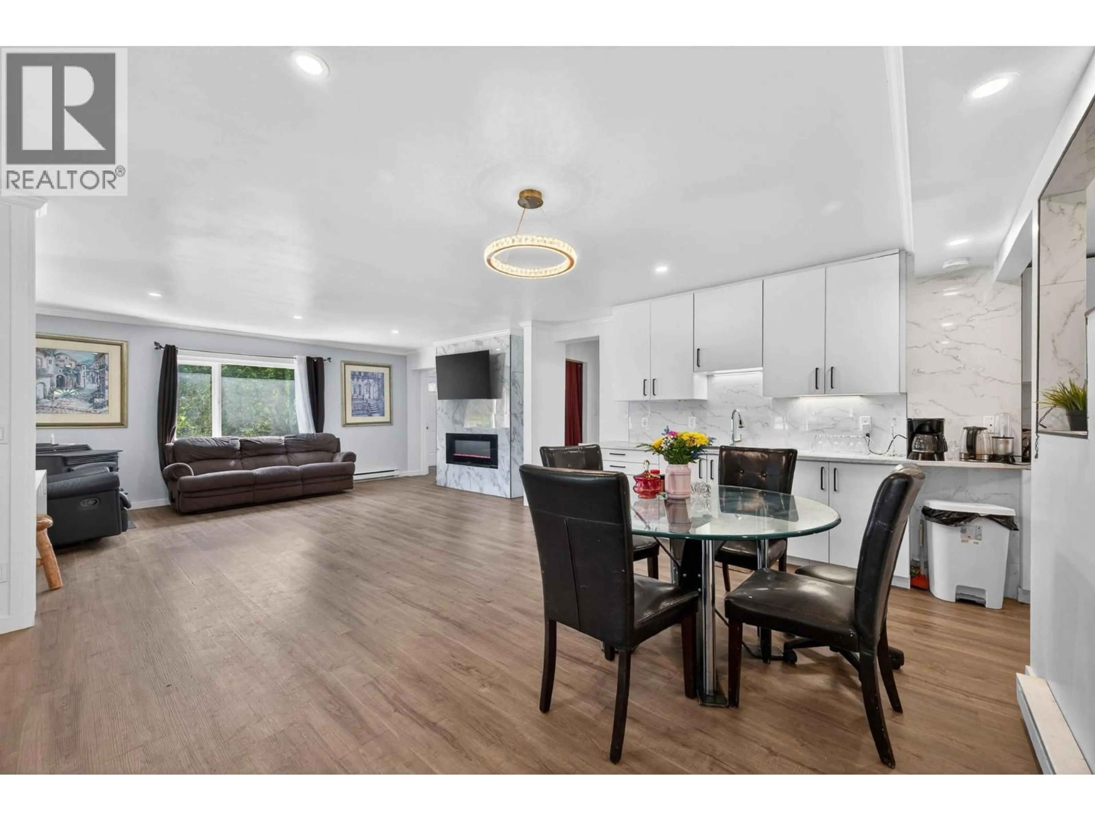 Open concept kitchen, wood/laminate floor for 6721 YELLOWHEAD HIGHWAY SOUTH, Barriere British Columbia V0E1E0