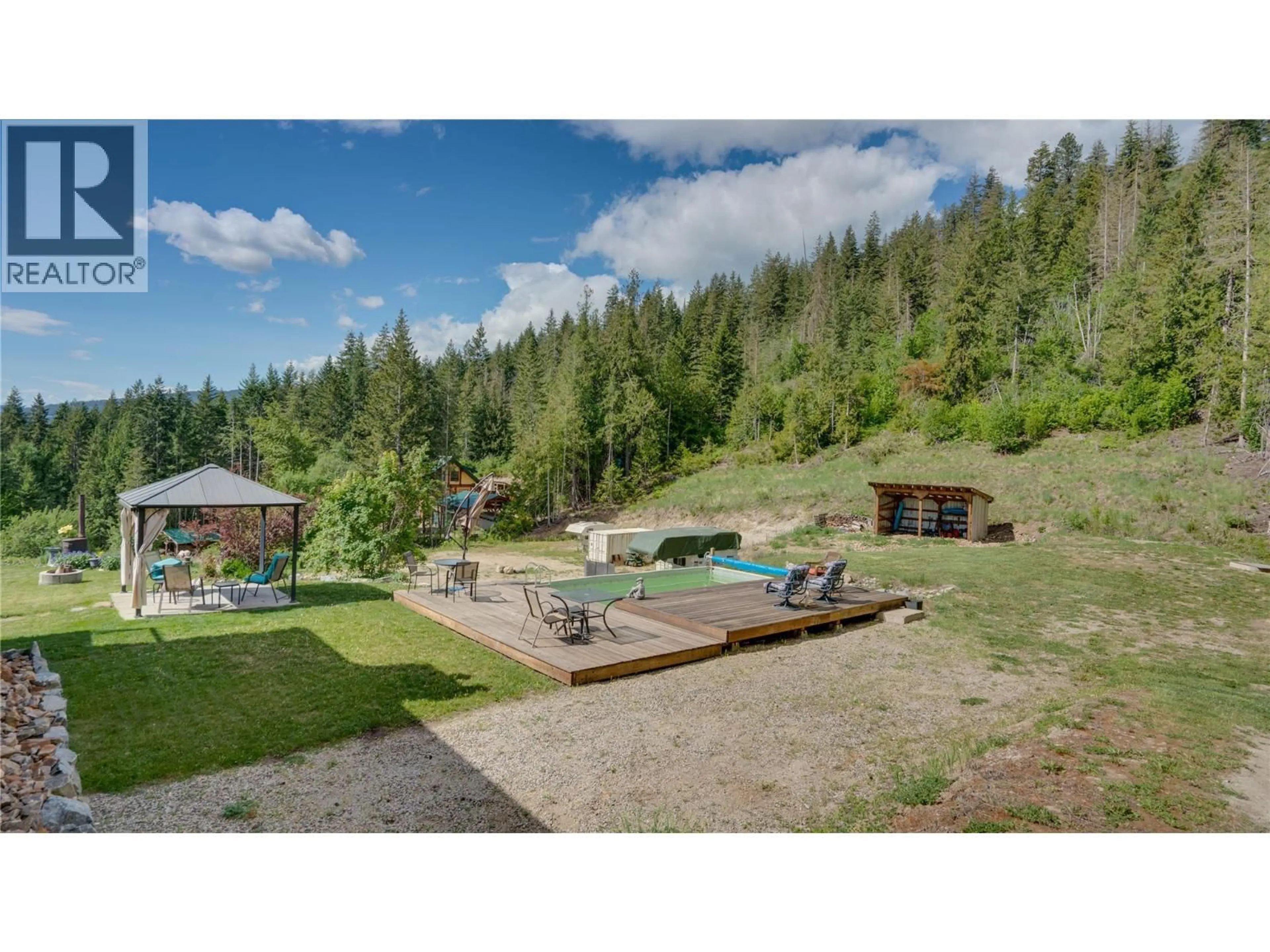 A pic from outside/outdoor area/front of a property/back of a property/a pic from drone, water/lake/river/ocean view for 48 STROULGER ROAD, Enderby British Columbia V0E1V3