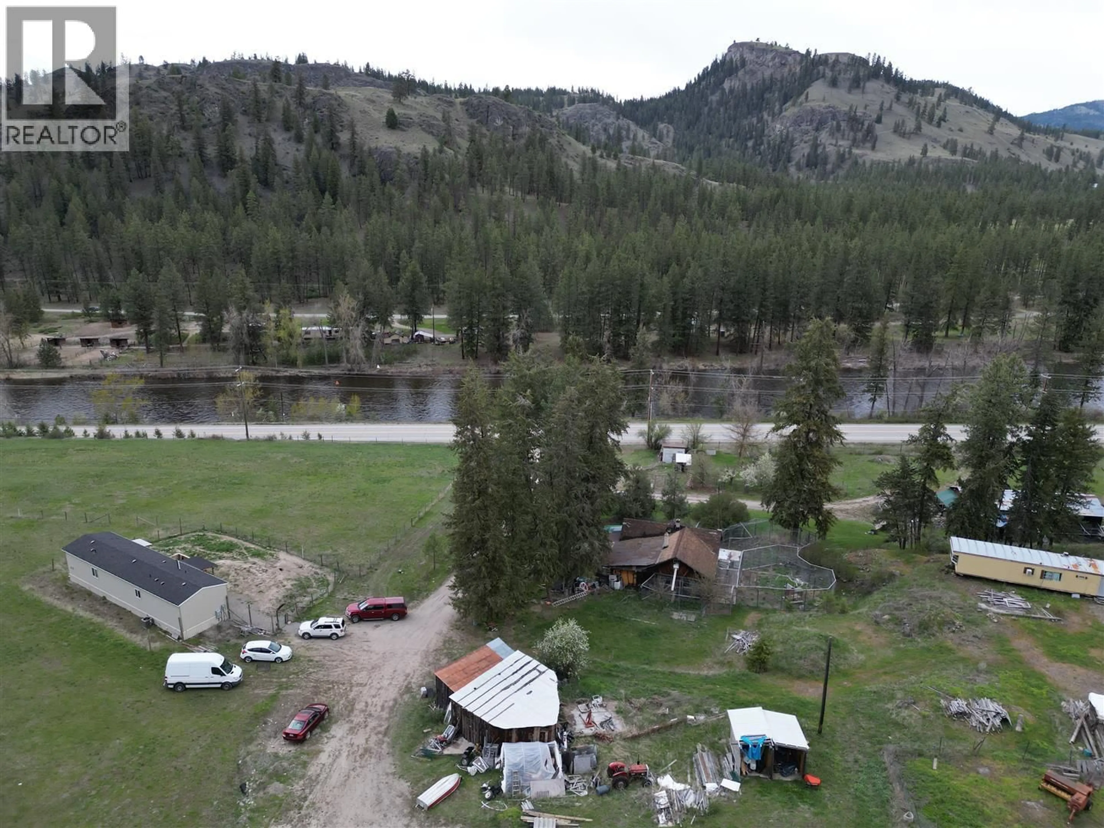 A pic from outside/outdoor area/front of a property/back of a property/a pic from drone, mountain view for 3940 HIGHWAY 3 OTHER, Rock Creek British Columbia V0H1Y0