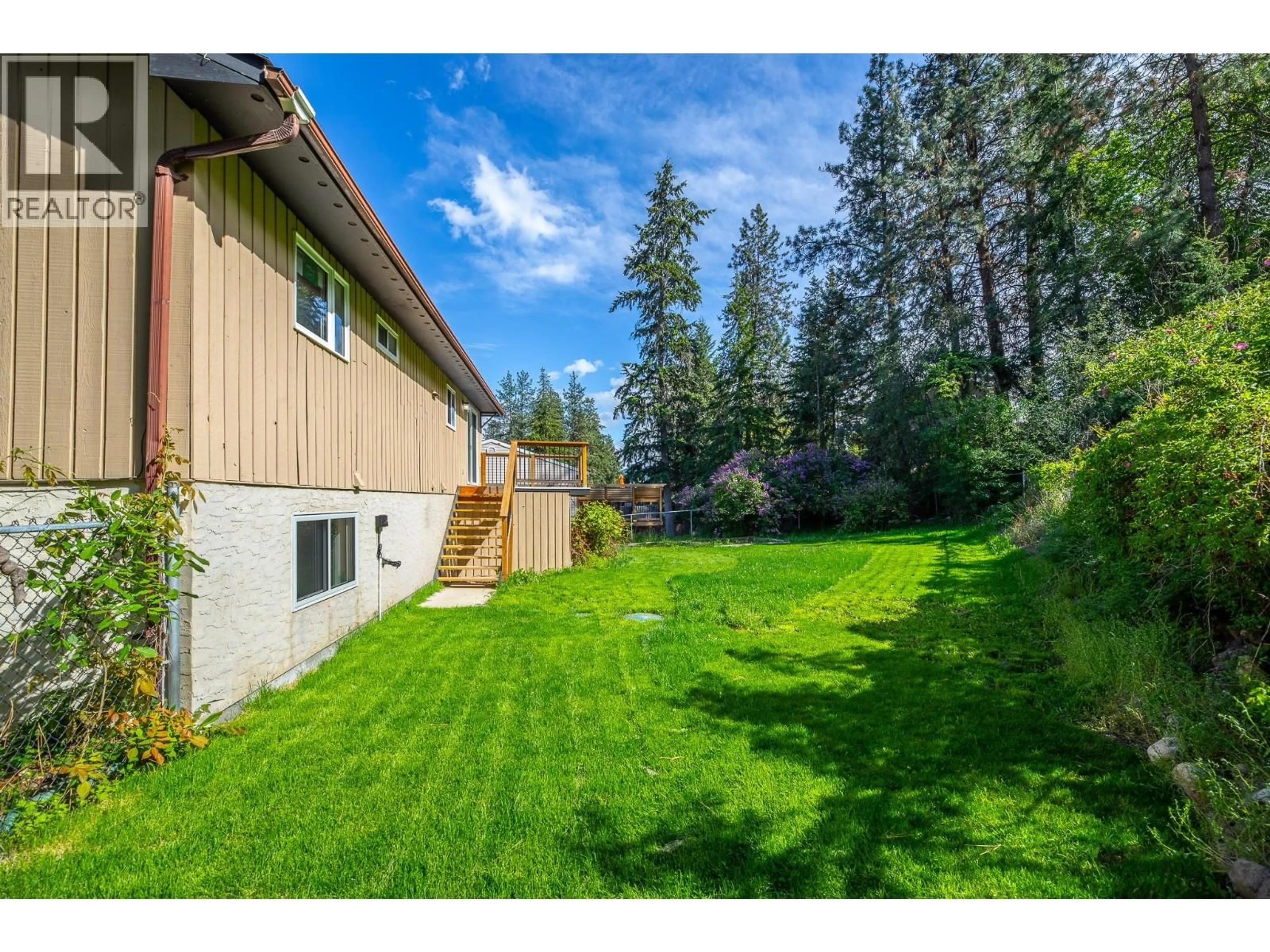 A pic from outside/outdoor area/front of a property/back of a property/a pic from drone, forest/trees view for 3436 MCTAGGART ROAD, West Kelowna British Columbia V4T1H7