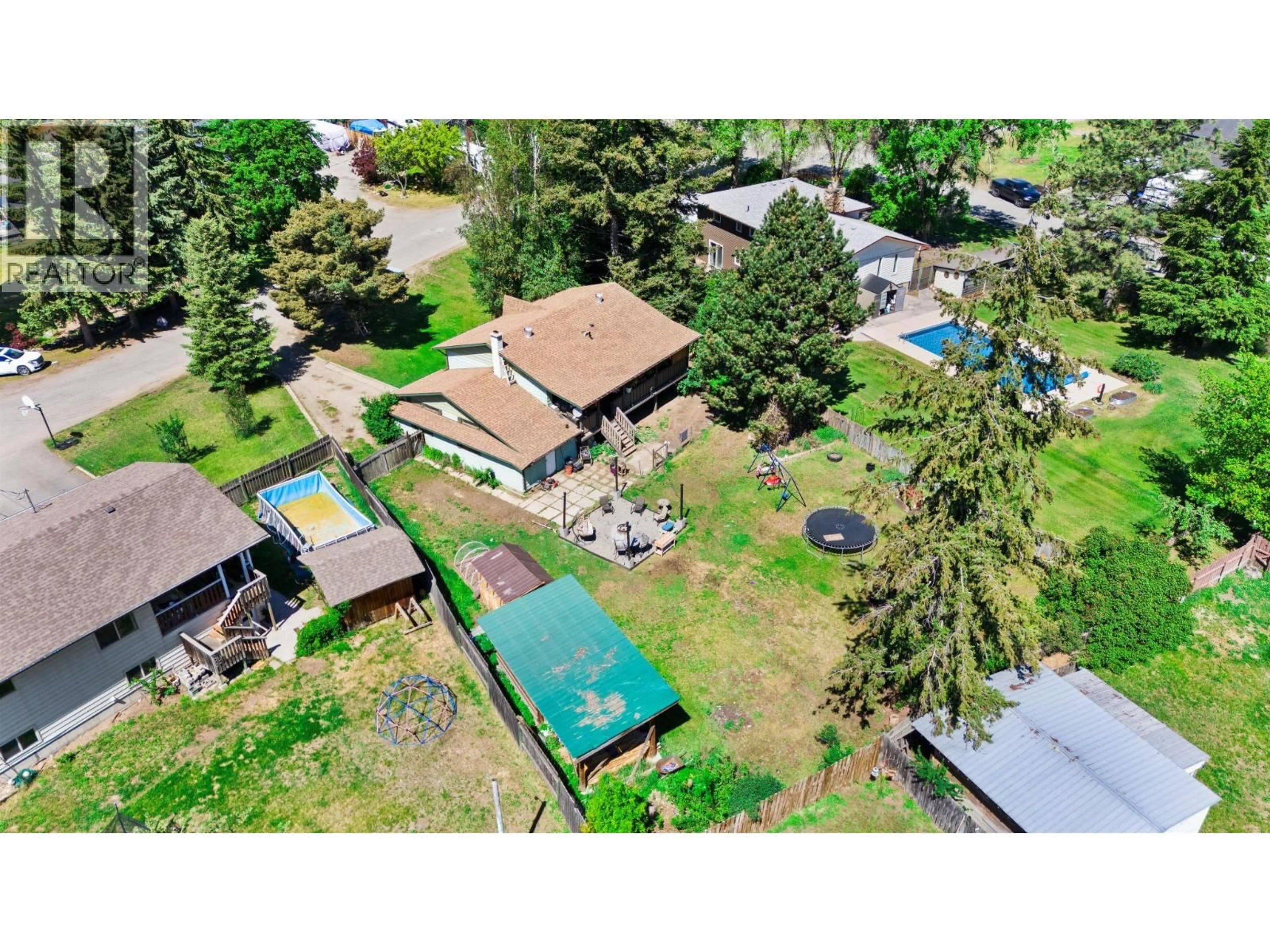 A pic from outside/outdoor area/front of a property/back of a property/a pic from drone, street for 4686 SPRUCE CRESCENT, Barriere British Columbia V0E1E0