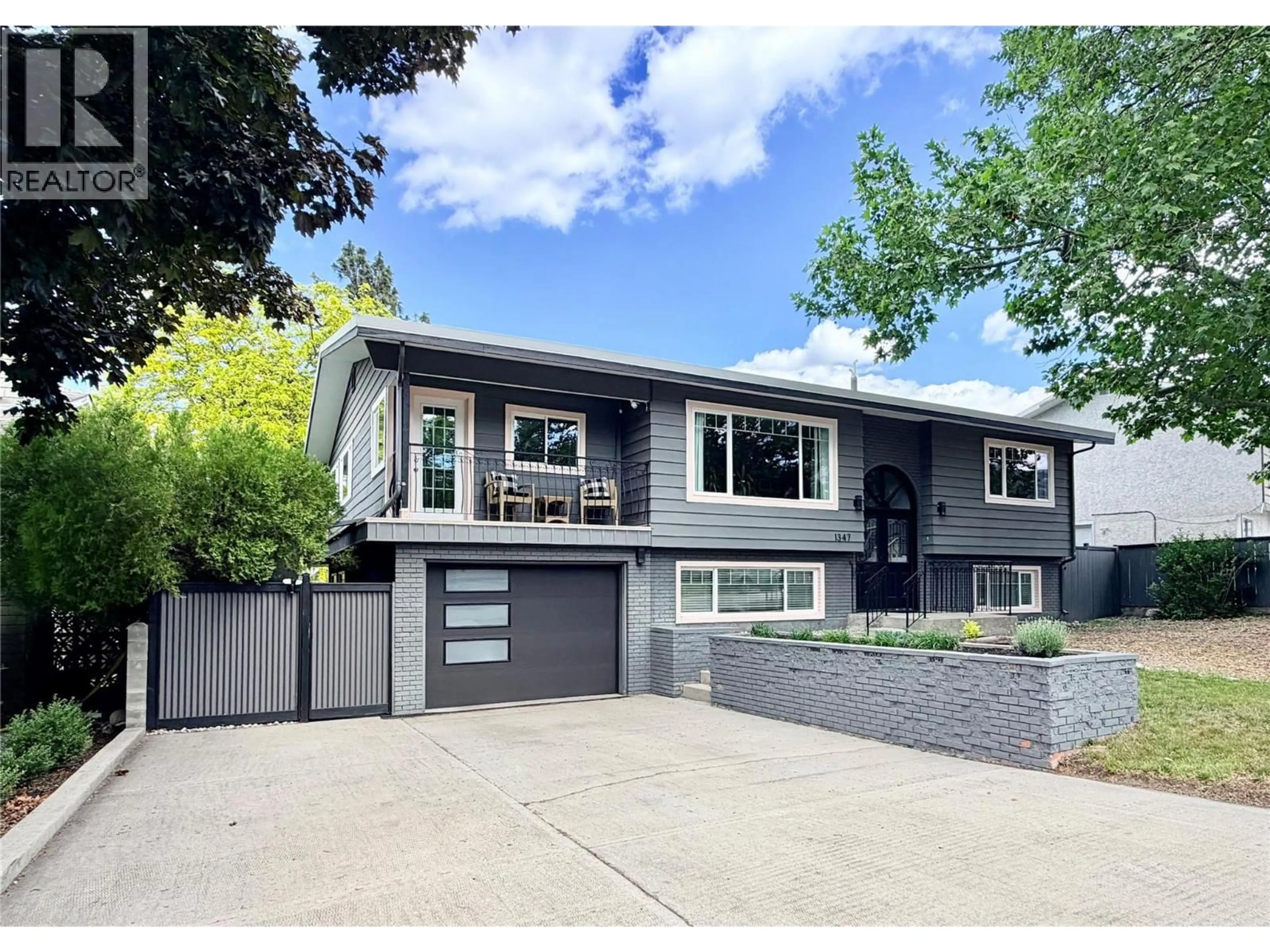 Home with brick exterior material, street for 1347 NAISH DRIVE, Penticton British Columbia V2A3B7