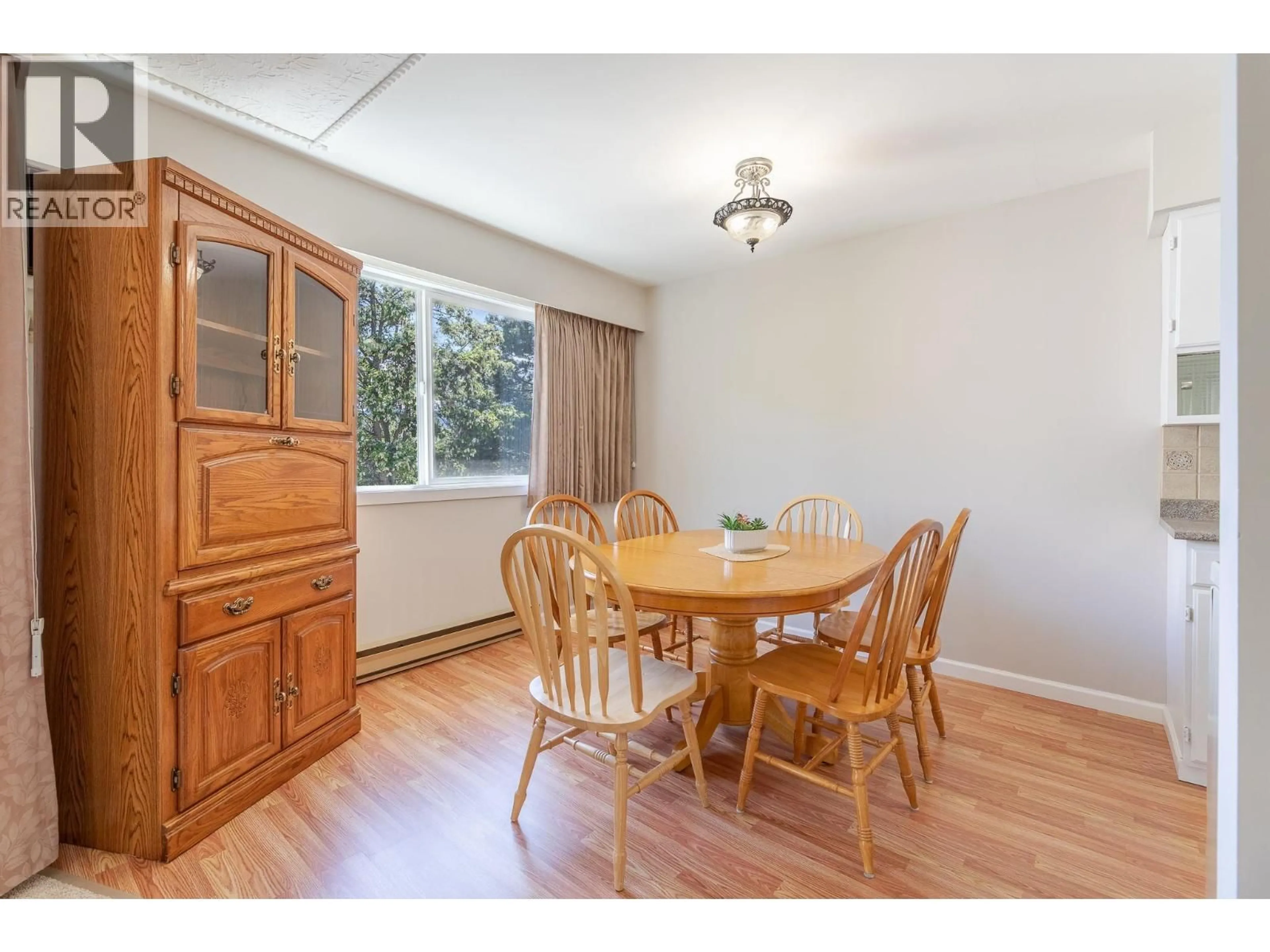 Dining room, wood/laminate floor for 203 - 22 ABBOTT STREET, Penticton British Columbia V2A4J2