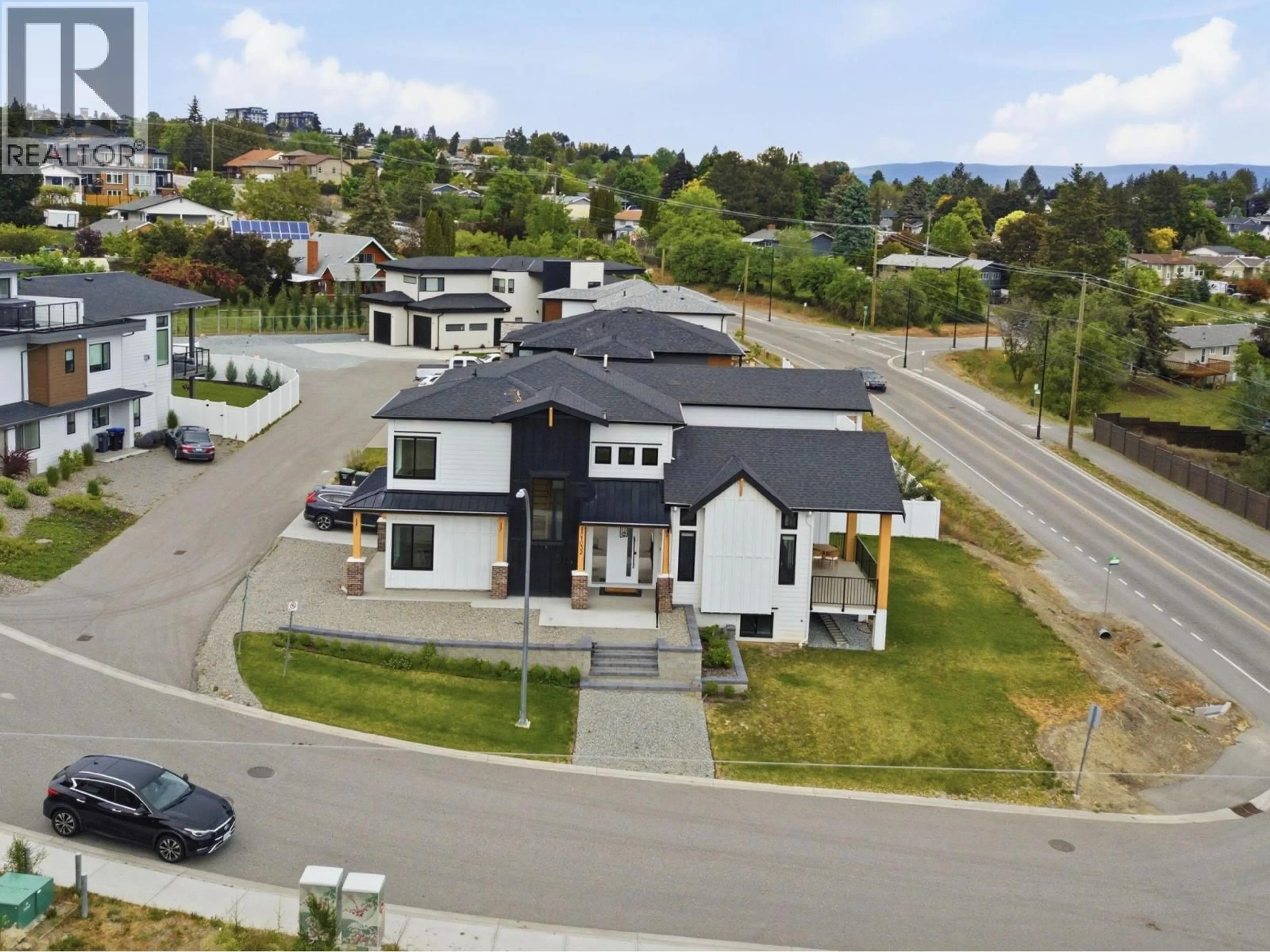 A pic from outside/outdoor area/front of a property/back of a property/a pic from drone, street for 1032 OAK BARREL LANE, West Kelowna British Columbia V1Z0A6