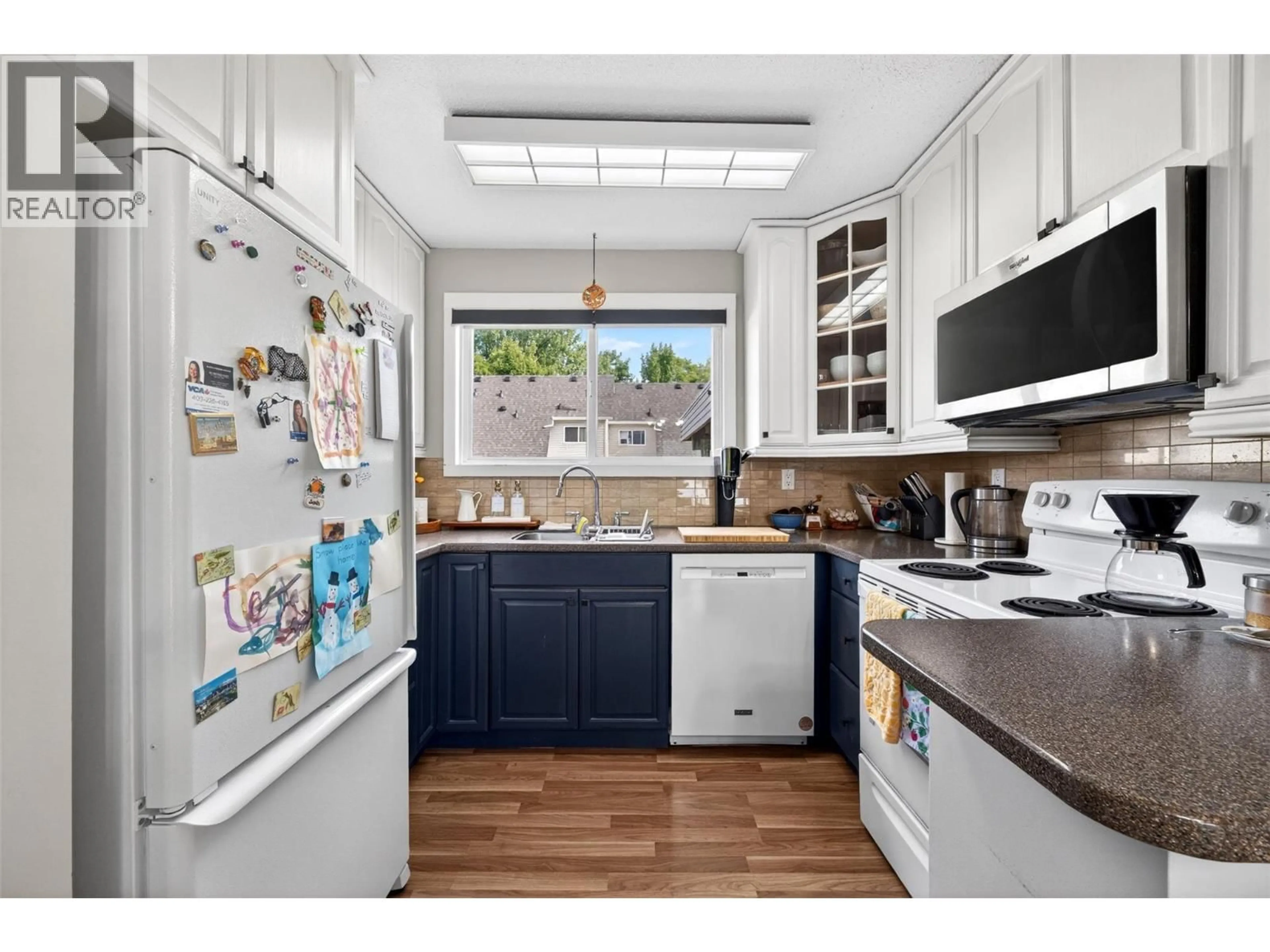 Standard kitchen, ceramic/tile floor for 2221 5 AVENUE NORTHEAST, Salmon Arm British Columbia V1E2J9