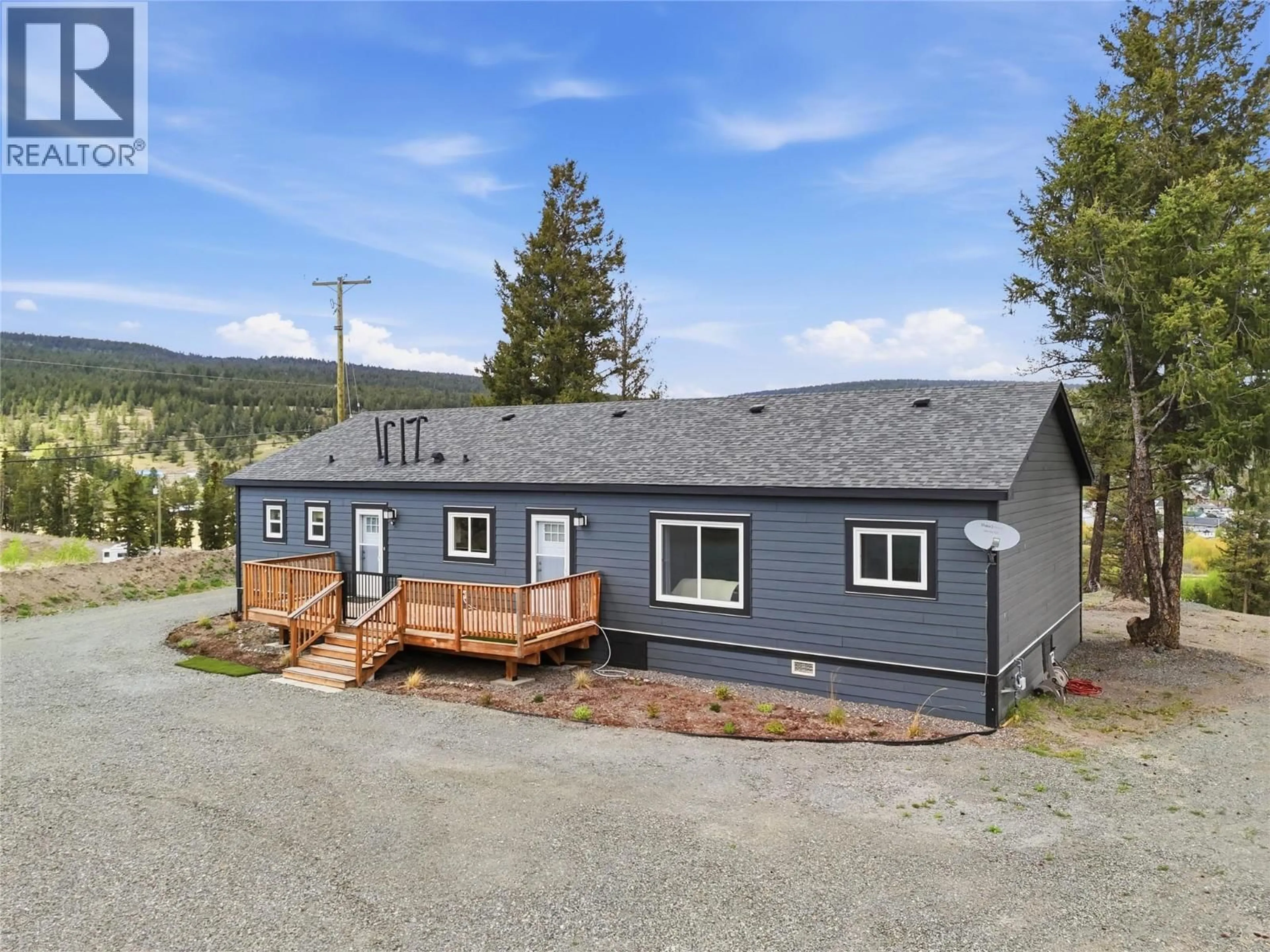 A pic from outside/outdoor area/front of a property/back of a property/a pic from drone, unknown for 1201 CARIBOO AVENUE, Clinton British Columbia V0K1K0
