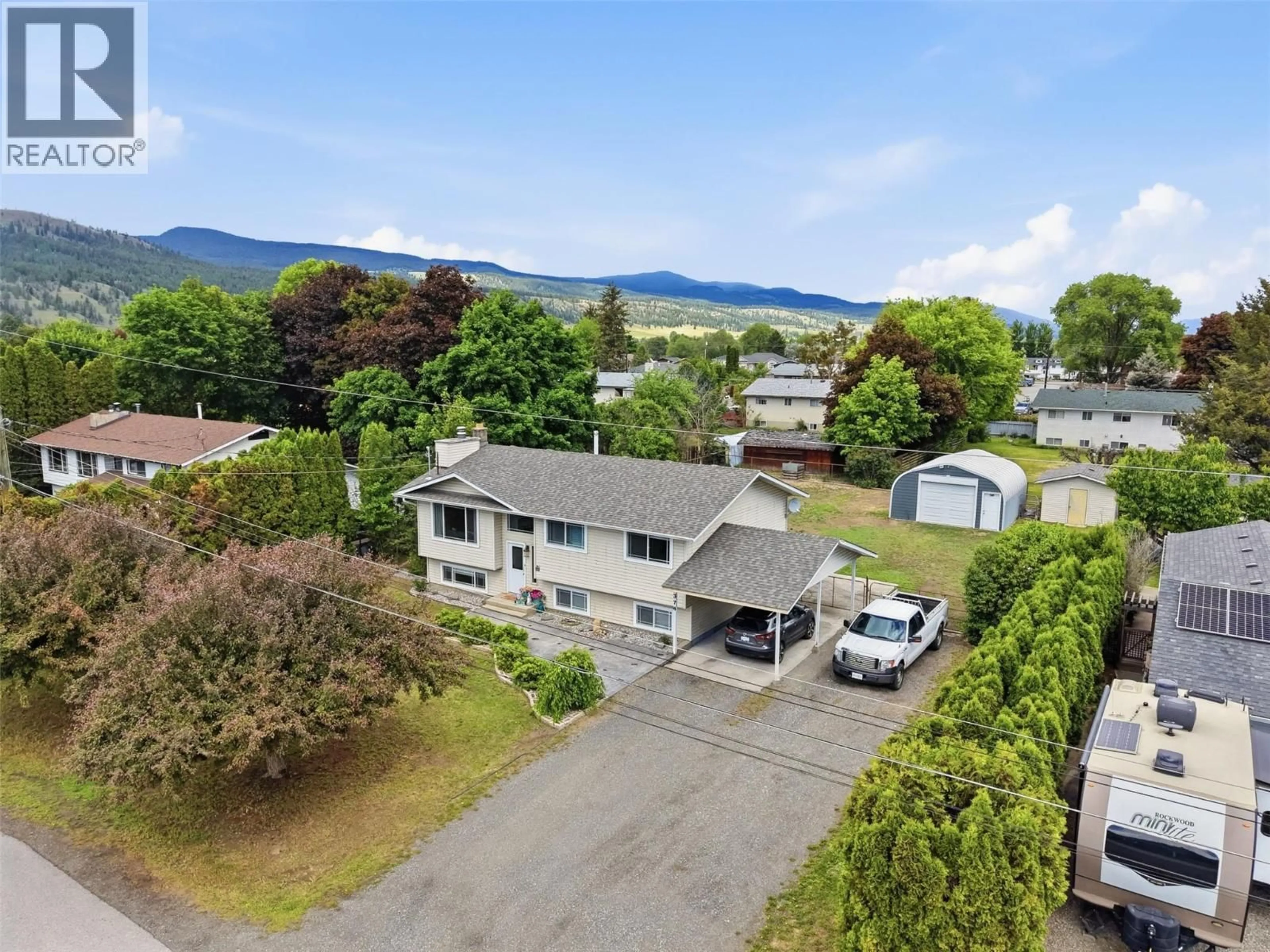 A pic from outside/outdoor area/front of a property/back of a property/a pic from drone, mountain view for 374 CHILCO AVENUE, Kamloops British Columbia V2H1L9