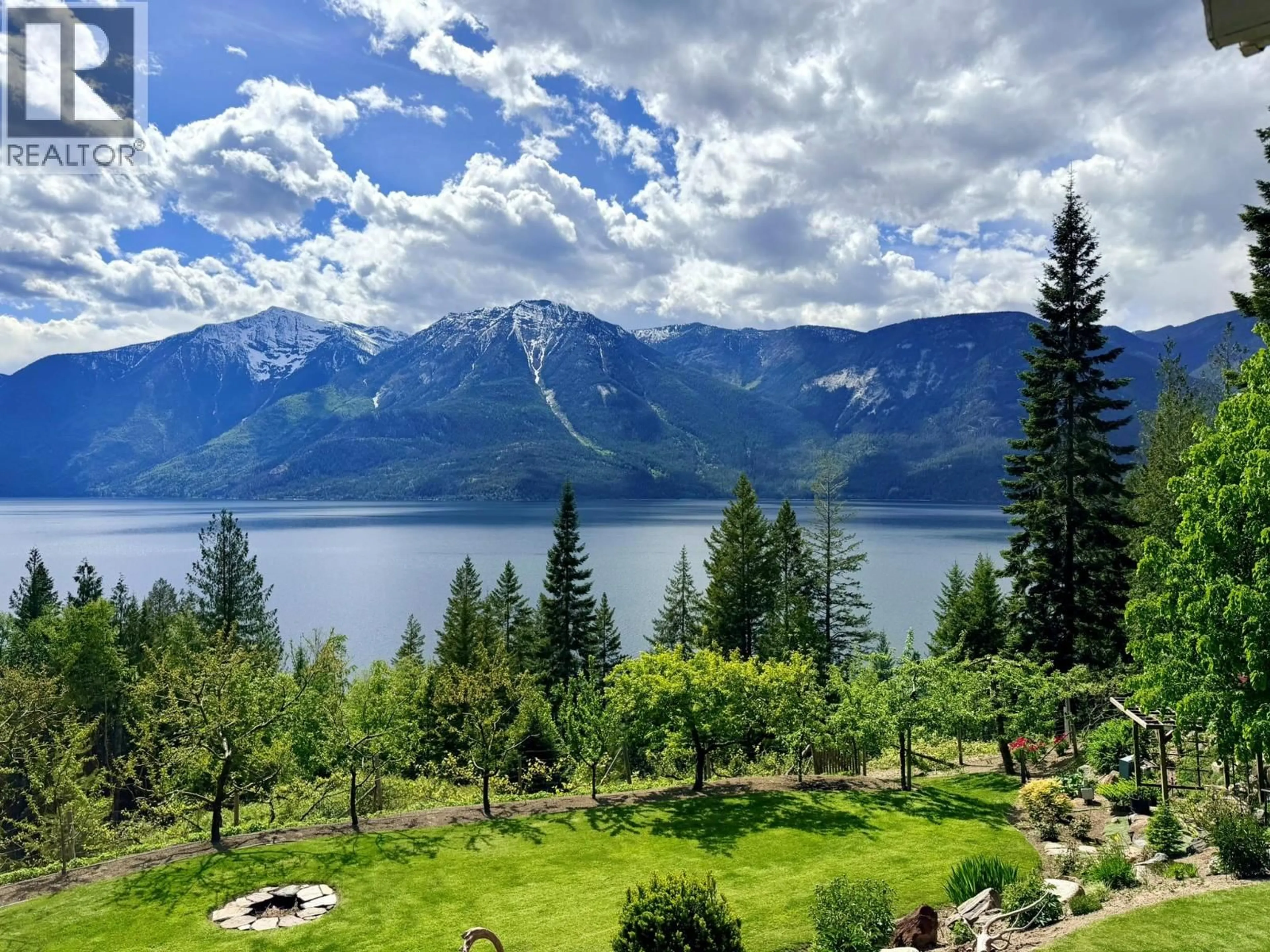 A pic from outside/outdoor area/front of a property/back of a property/a pic from drone, water/lake/river/ocean view for 13643 MOUNTAIN SHORES ROAD NORTH, Boswell British Columbia V0B1A4