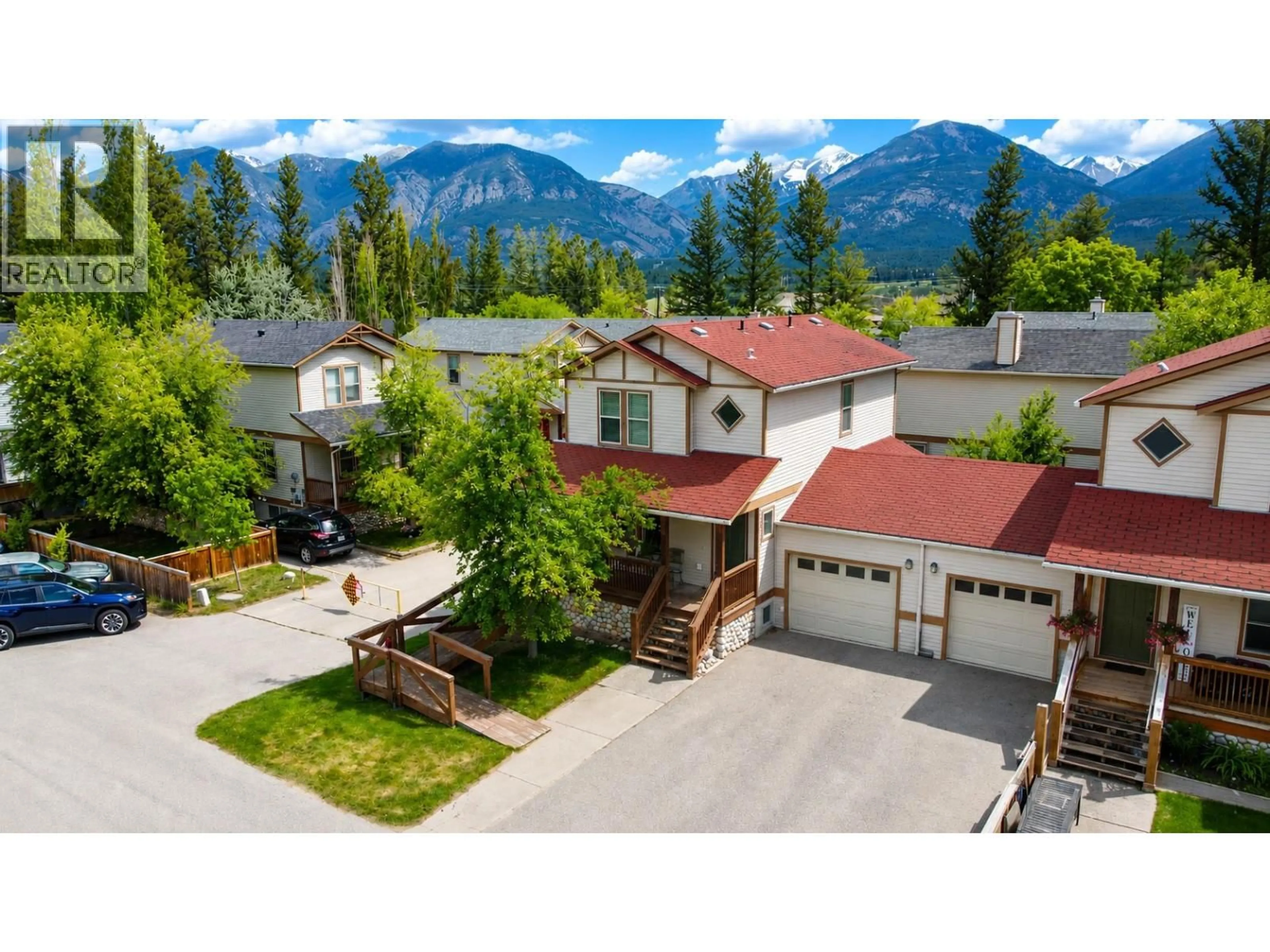 A pic from outside/outdoor area/front of a property/back of a property/a pic from drone, mountain view for 1 - 147 11 AVENUE, Invermere British Columbia V0A1K0