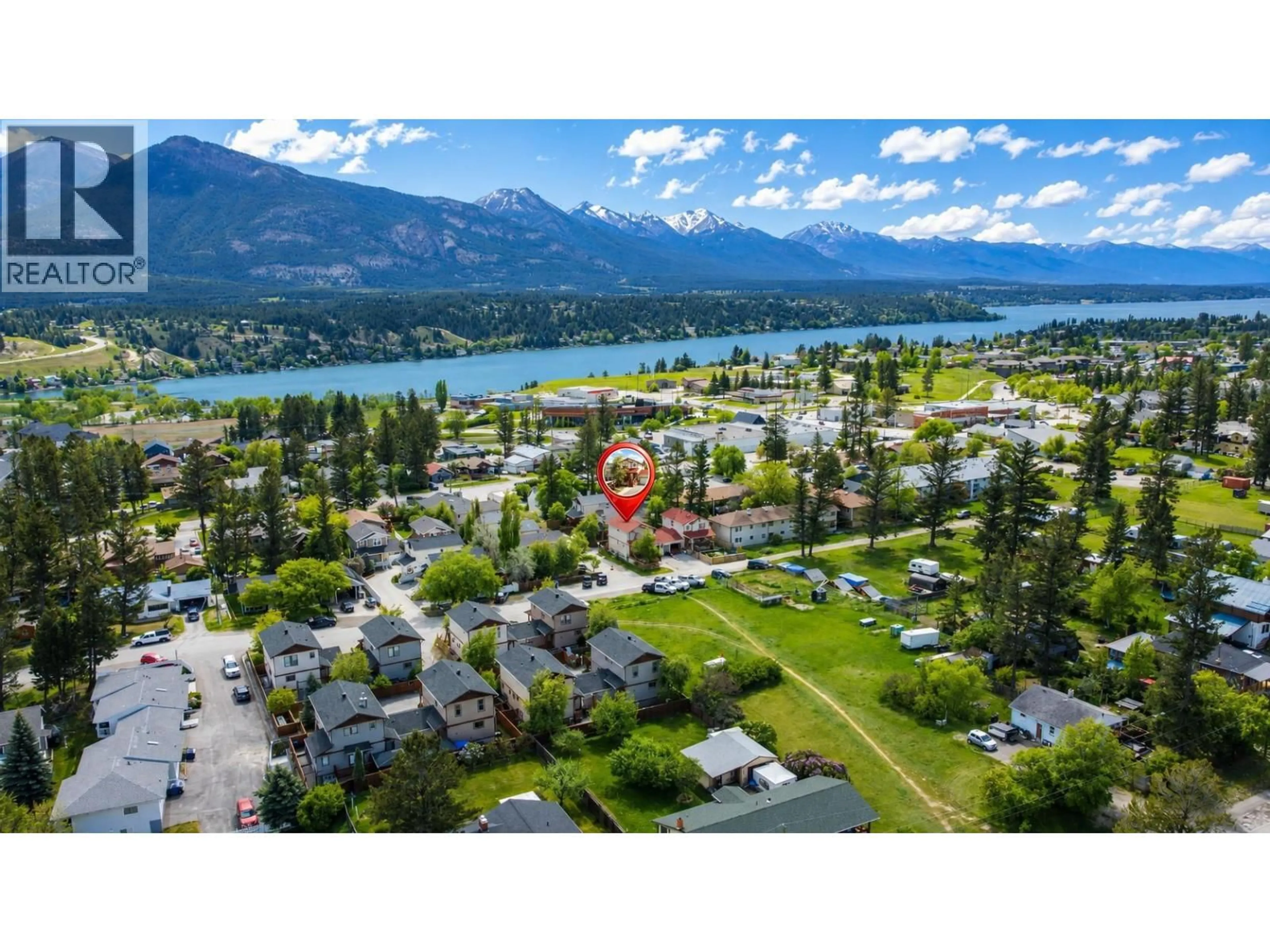 A pic from outside/outdoor area/front of a property/back of a property/a pic from drone, mountain view for 1 - 147 11 AVENUE, Invermere British Columbia V0A1K0