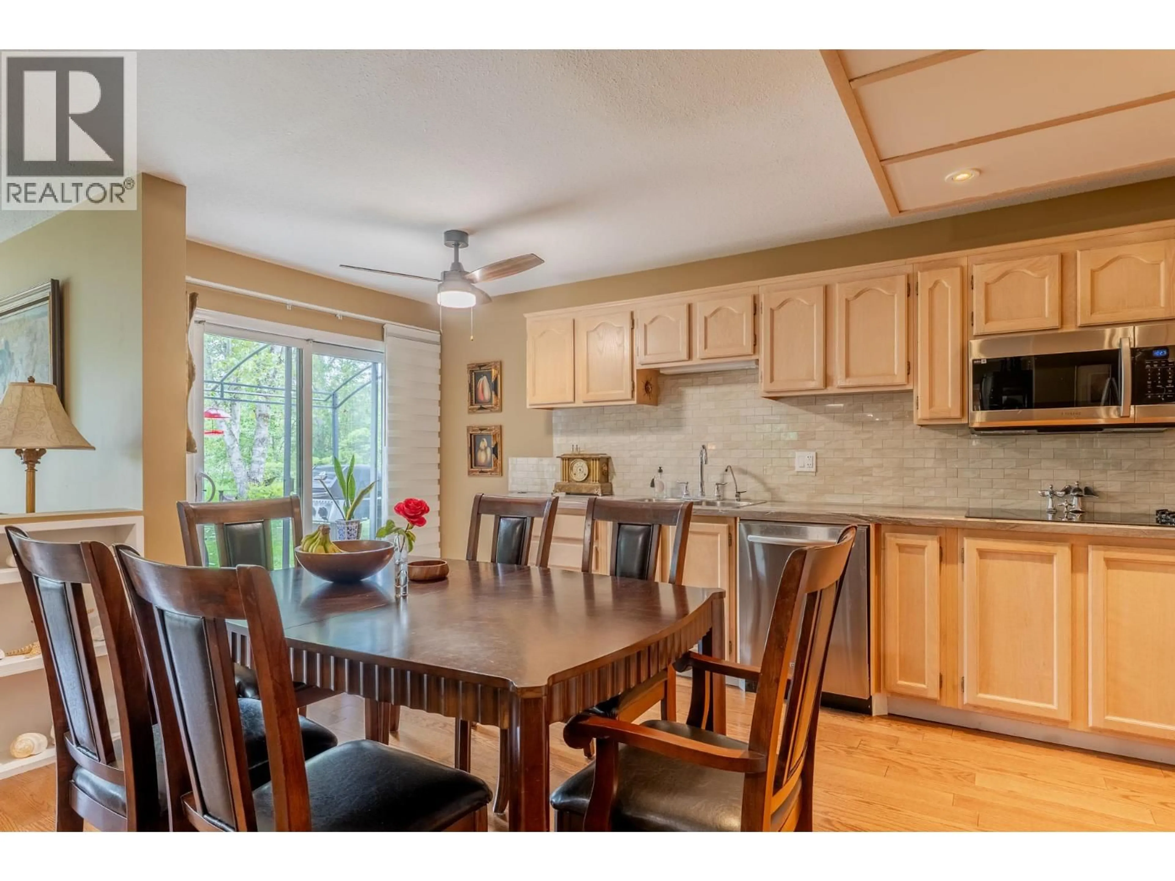 Open concept kitchen, wood/laminate floor for 1312 - 415 COMMONWEALTH ROAD, Kelowna British Columbia V4V1P4