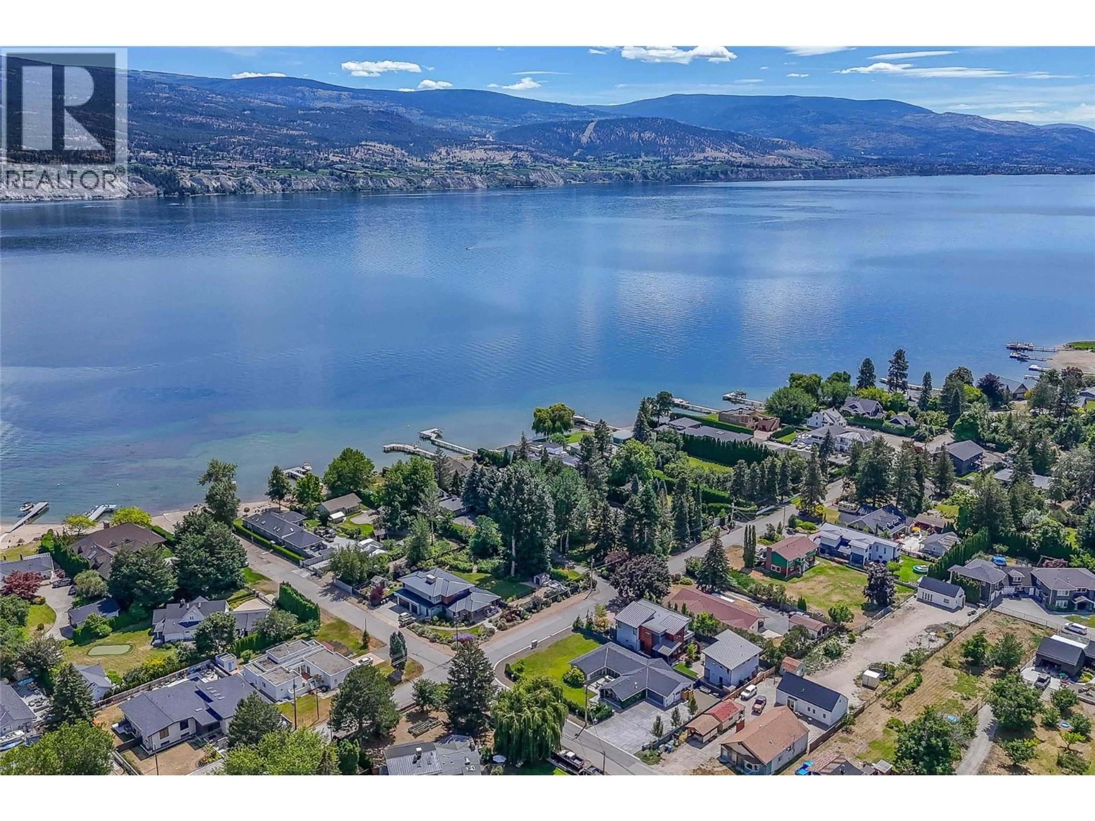 A pic from outside/outdoor area/front of a property/back of a property/a pic from drone, water/lake/river/ocean view for 5212 WOODS AVENUE, Summerland British Columbia V0H1Z9