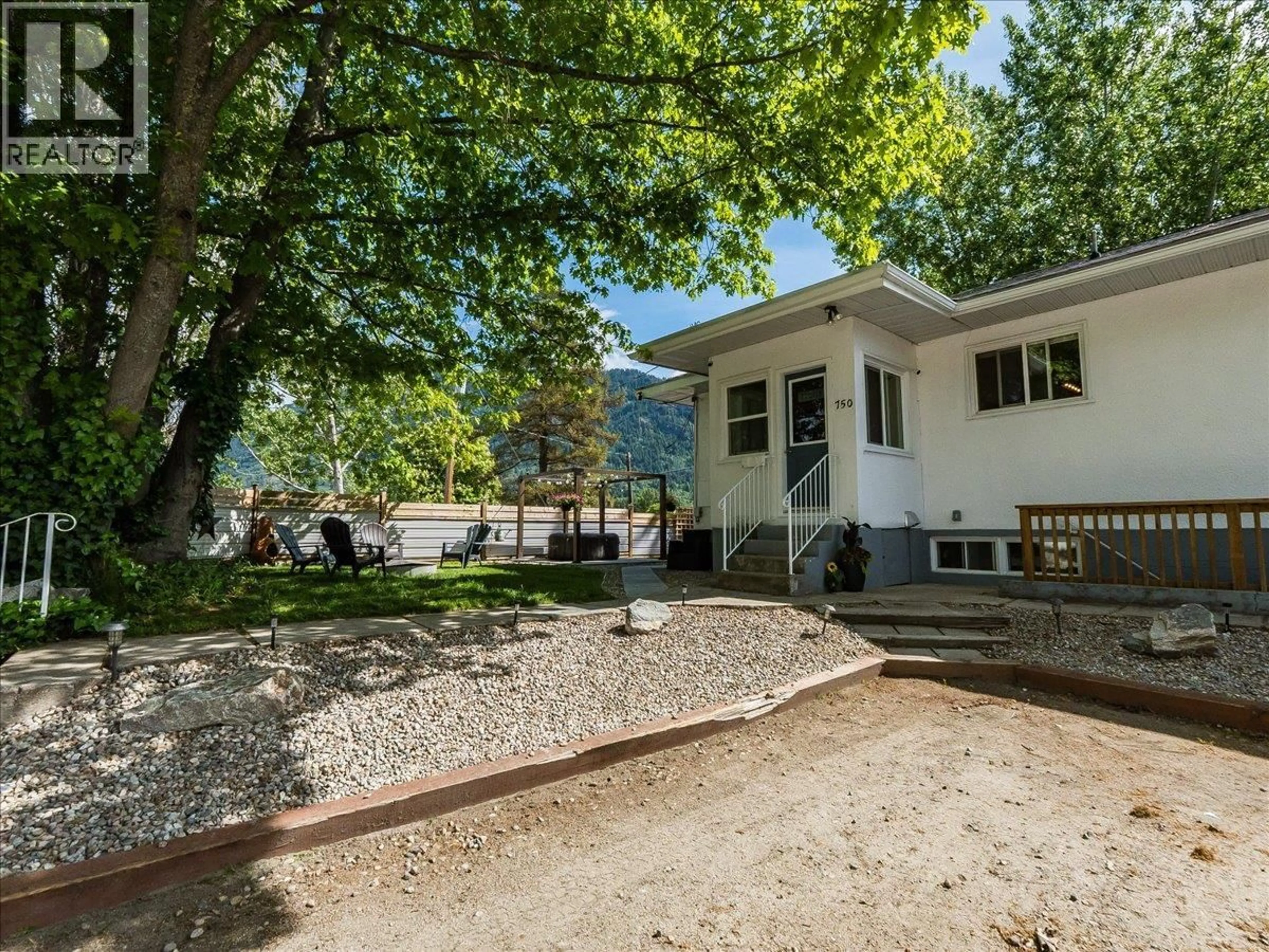 A pic from outside/outdoor area/front of a property/back of a property/a pic from drone, mountain view for 750 7TH AVENUE, Castlegar British Columbia V1N1R7