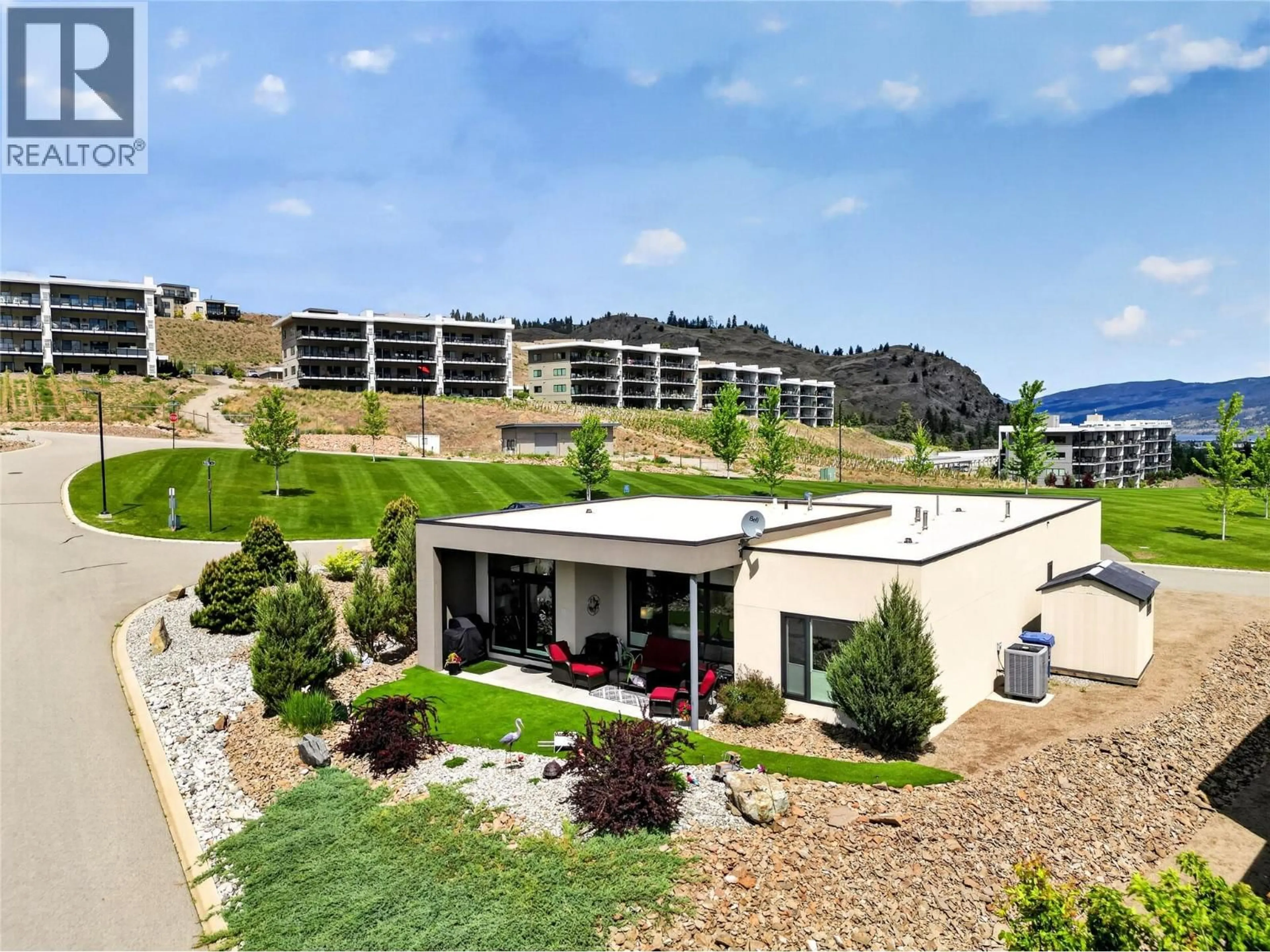 A pic from outside/outdoor area/front of a property/back of a property/a pic from drone, unknown for 121 RIDGE PARK, Penticton British Columbia V2A0B1