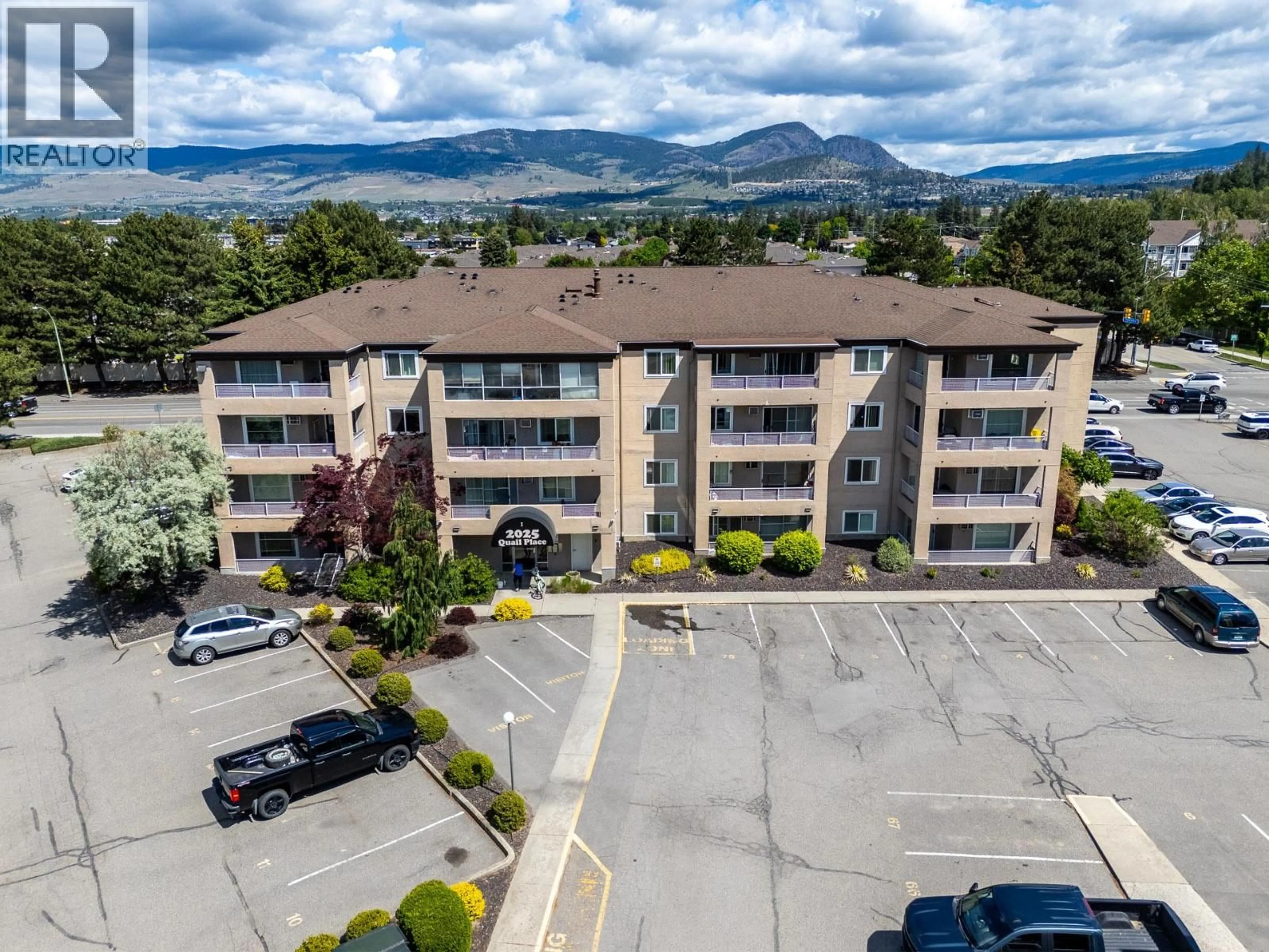 A pic from outside/outdoor area/front of a property/back of a property/a pic from drone, mountain view for 206 - 2025 BARON ROAD, Kelowna British Columbia V1X7G3