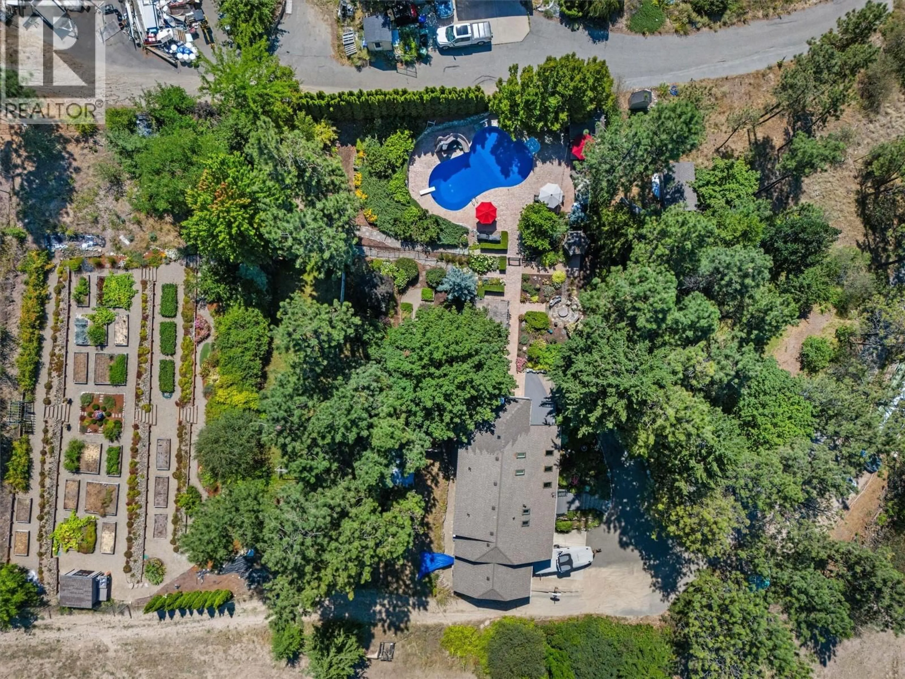 A pic from outside/outdoor area/front of a property/back of a property/a pic from drone, unknown for 13961 MOBERLY ROAD, Lake Country British Columbia V4V1A6