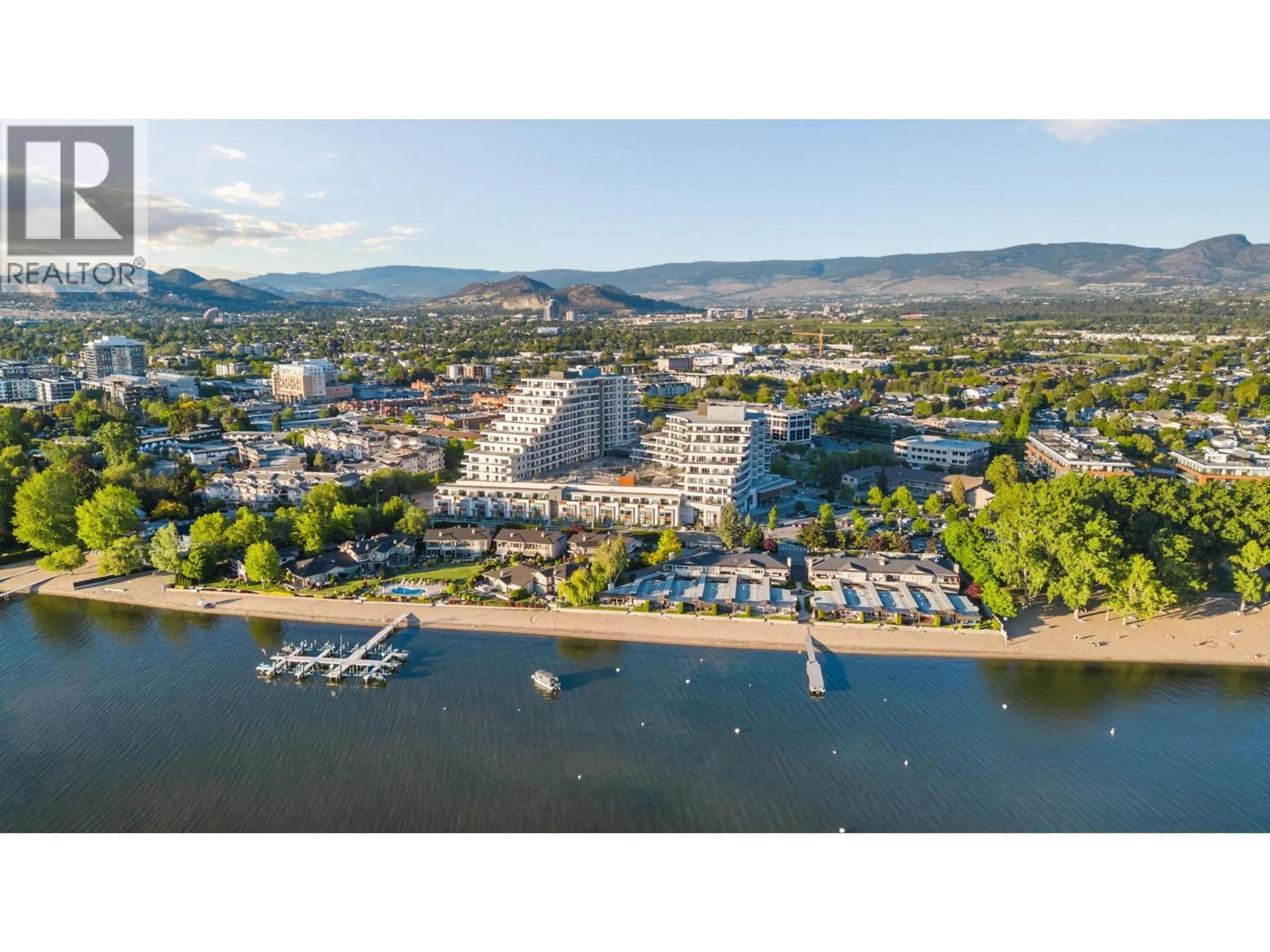 A pic from outside/outdoor area/front of a property/back of a property/a pic from drone, water/lake/river/ocean view for 707 - 3340 LAKESHORE ROAD, Kelowna British Columbia V1W3S9